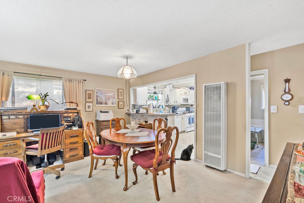 23328 Brookside Road Crestline, CA 92325 - Photo 29 of 40 a dining room with furniture and window