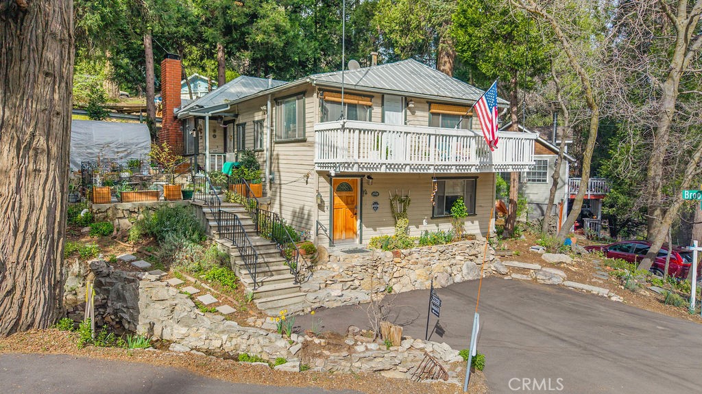23328 Brookside Road Crestline, CA 92325 - Photo 37 of 40 front view of a house with a porch