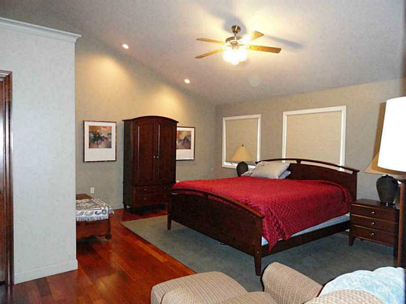 4 Renaissance Drive Irwin, PA 15642 - Photo 18 of 25 Master Bedroom. very spacious 17 x 19 with exposed Brazilian hard wood floors and vaulted ceiling. Walk in closet with organizer