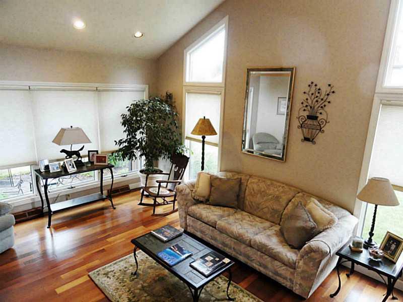 Living Room. with floor to ceiling windows. Brazilian hardwood floors