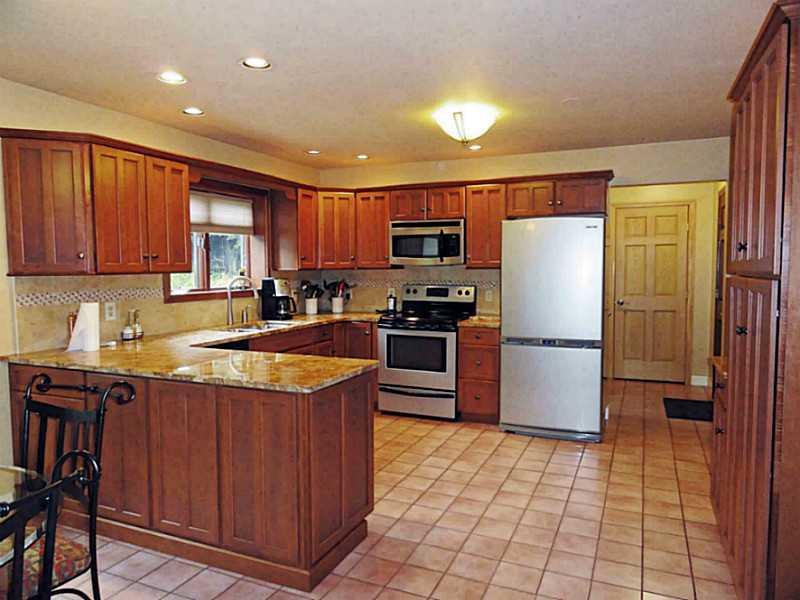 Kitchen. Updated in 2011 with maple cabinets, granite, undermount sink and SS appliances