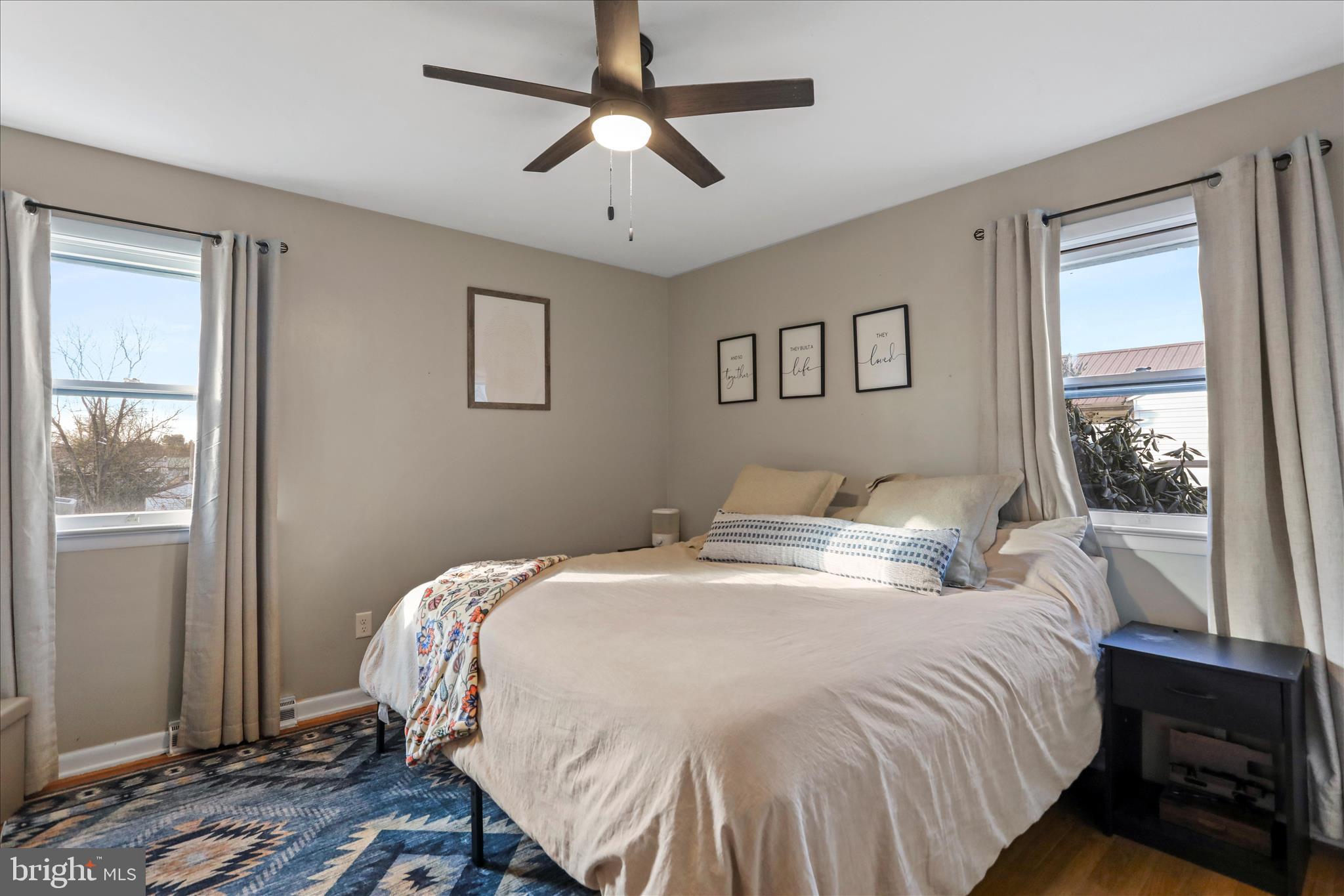 4402 Shatzer Street Chambersburg, PA 17202 - Photo 11 of 30 a bedroom with a large bed and a window