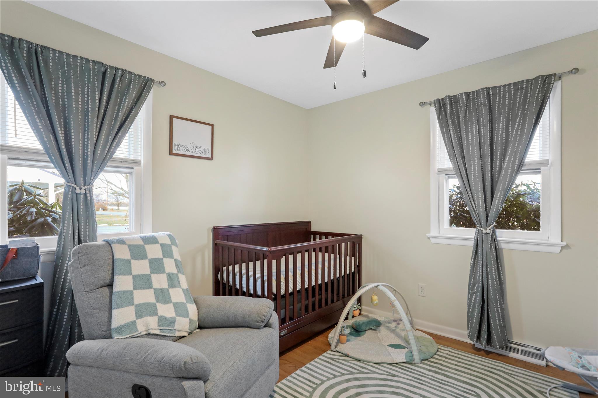 4402 Shatzer Street Chambersburg, PA 17202 - Photo 14 of 30 a bedroom with a bed and a couch