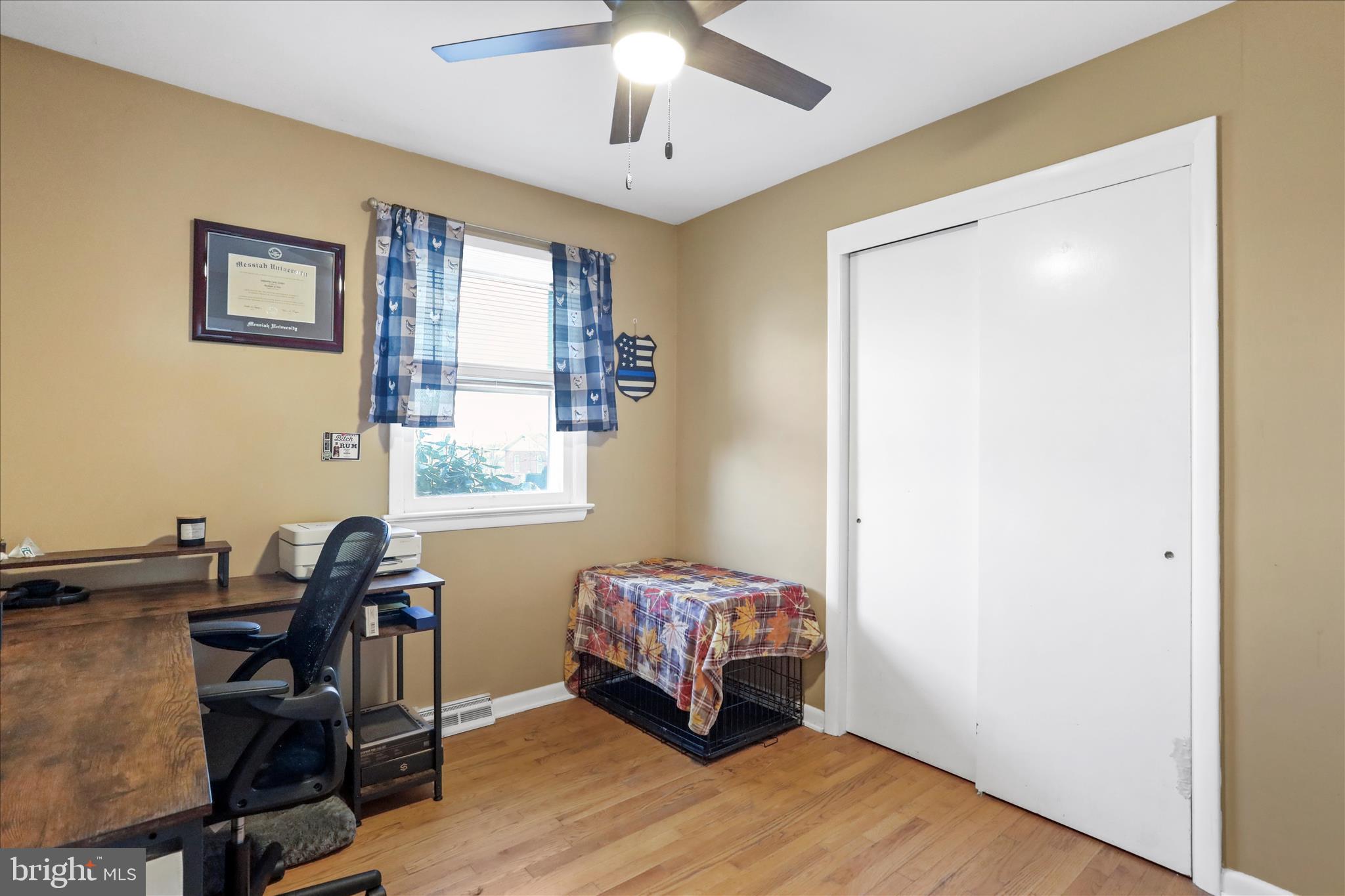 4402 Shatzer Street Chambersburg, PA 17202 - Photo 16 of 30 a room with chair and window
