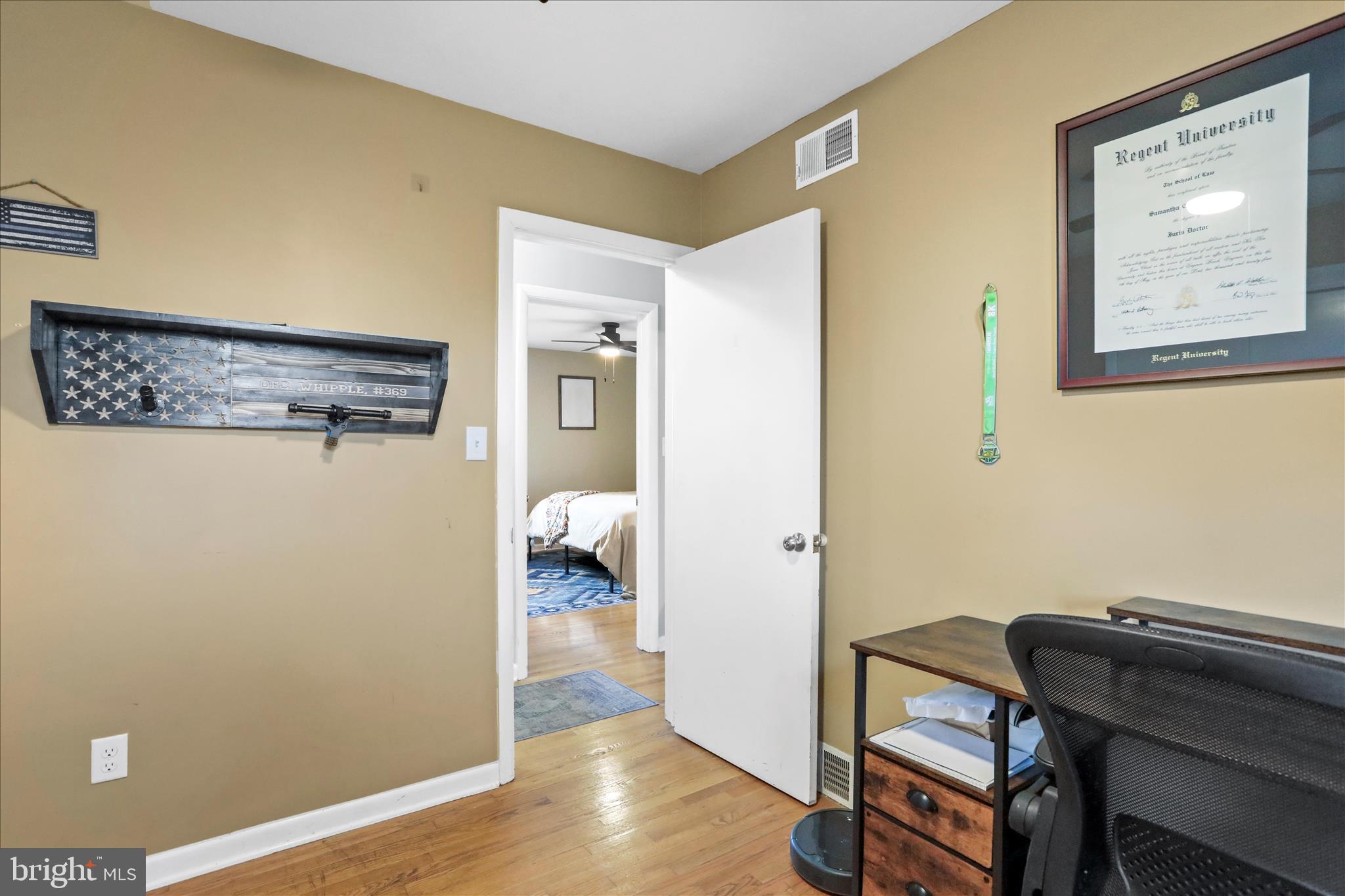 4402 Shatzer Street Chambersburg, PA 17202 - Photo 17 of 30 a view of a hallway with workspace