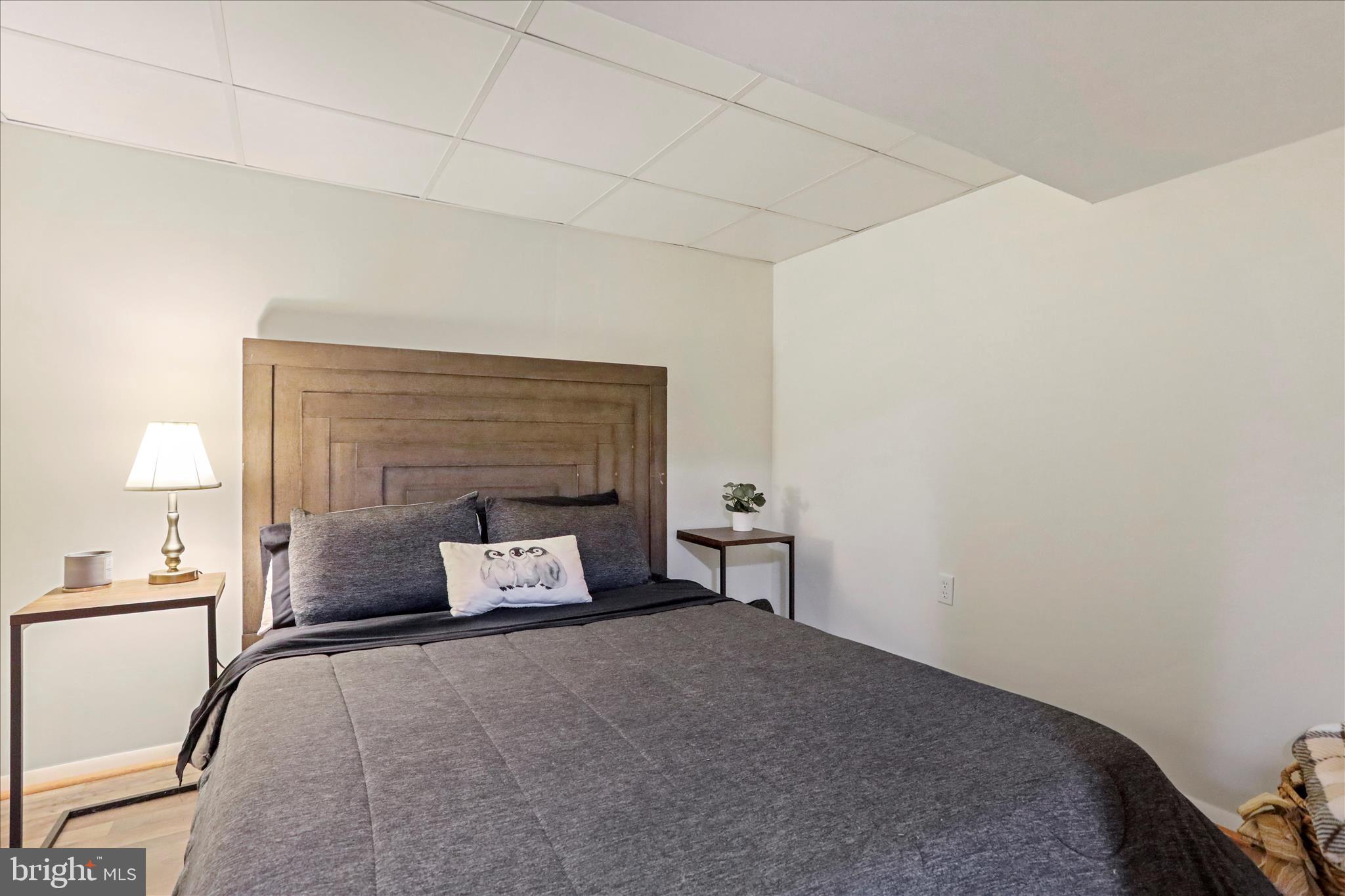 4402 Shatzer Street Chambersburg, PA 17202 - Photo 24 of 30 a living room with furniture and a fireplace