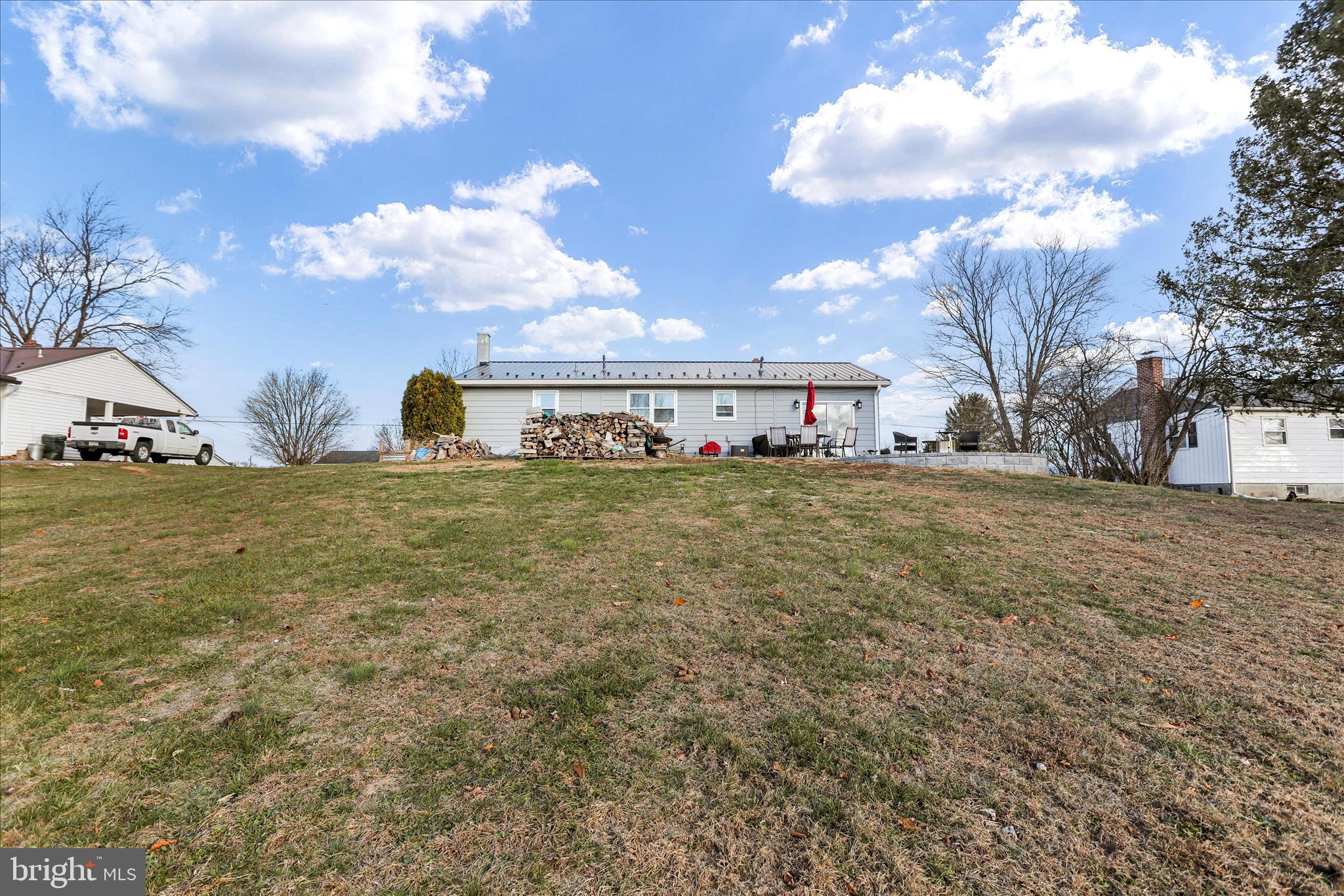 4402 Shatzer Street Chambersburg, PA 17202 - Photo 30 of 30 a view of a house with a big yard