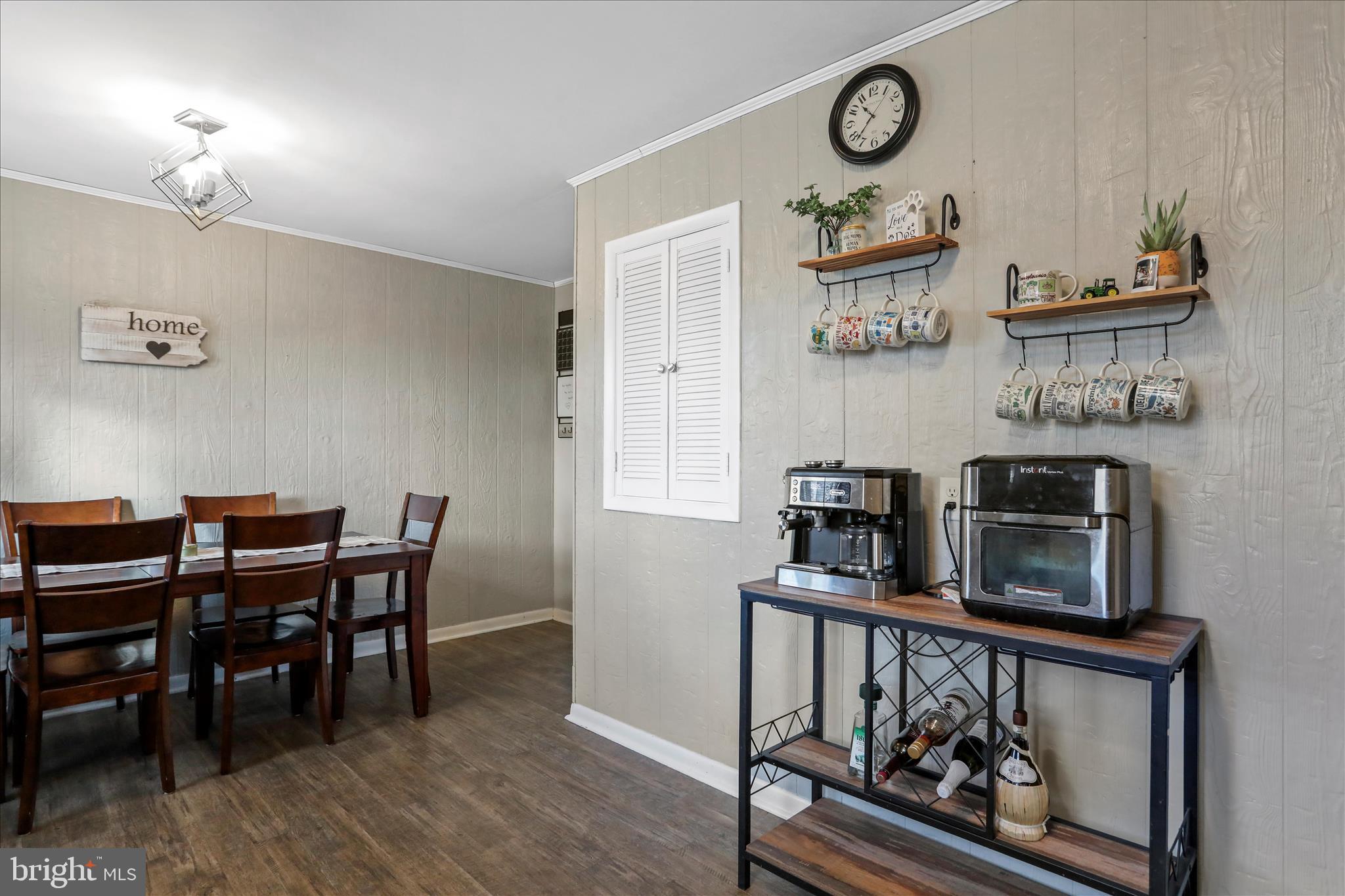 4402 Shatzer Street Chambersburg, PA 17202 - Photo 10 of 30 a view of a dining room with furniture and wooden floor