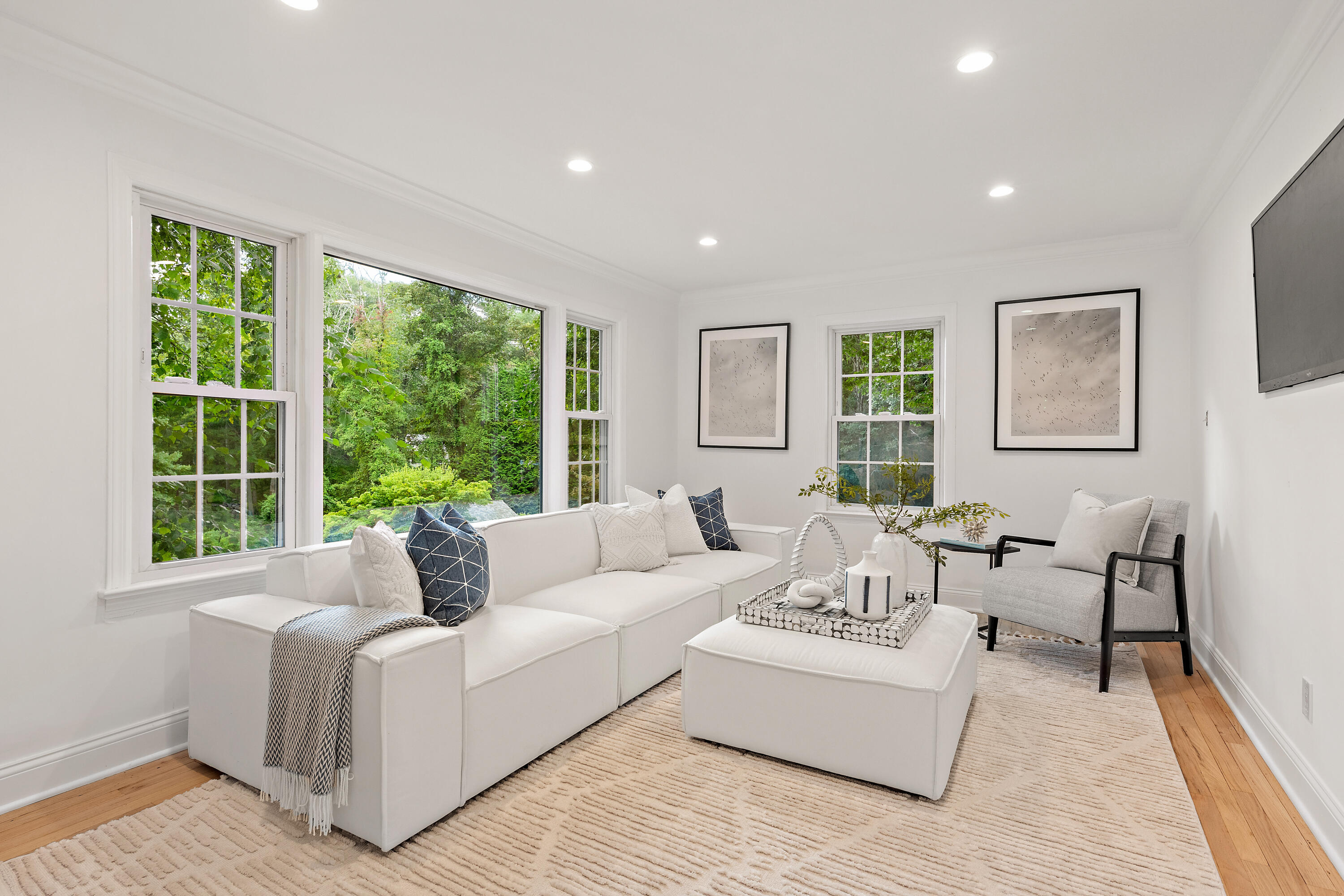 69 Mariomi Road New Canaan, CT 06840 - Photo 11 of 30 a living room with furniture and a large window