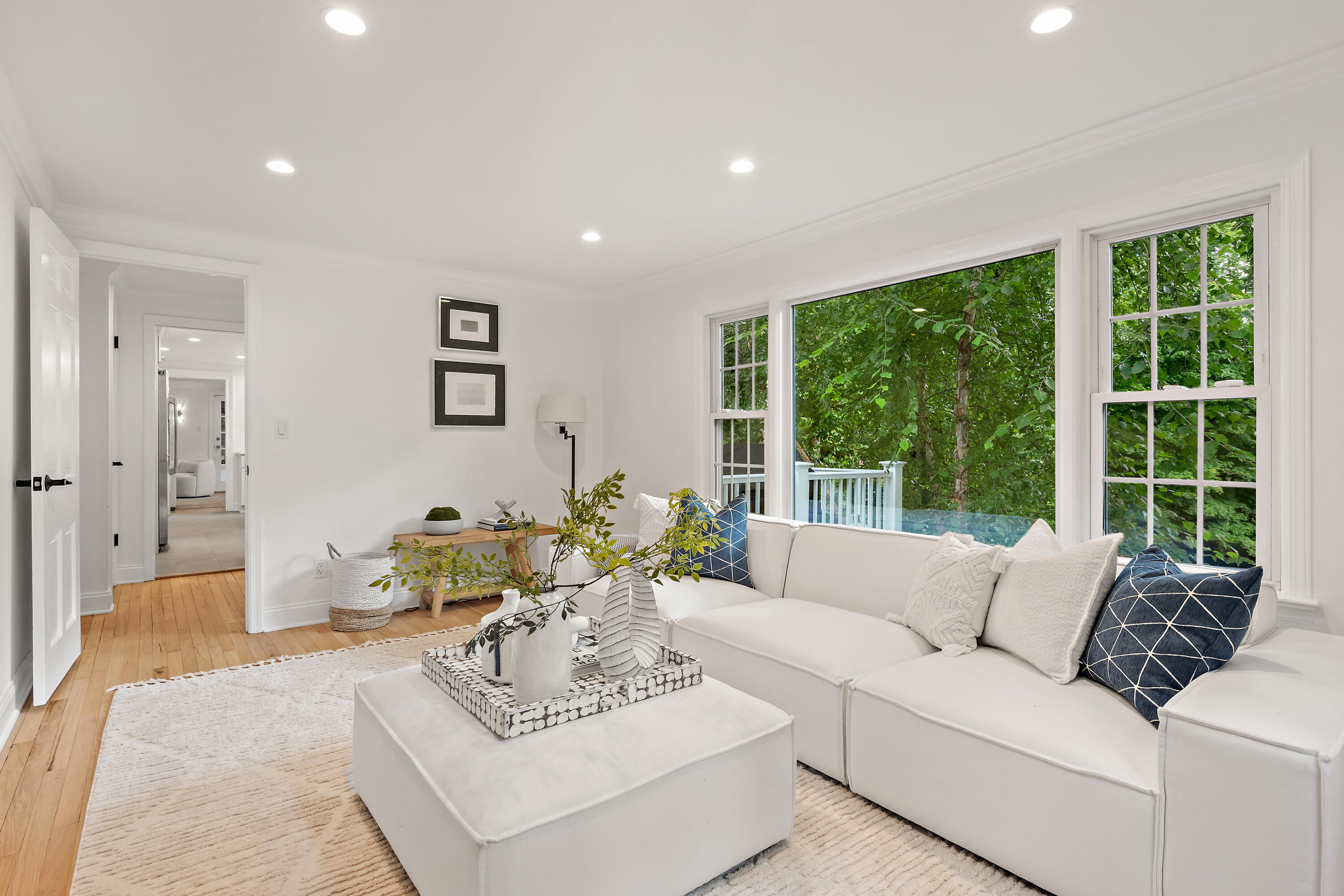 69 Mariomi Road New Canaan, CT 06840 - Photo 12 of 30 a living room with furniture and a large window
