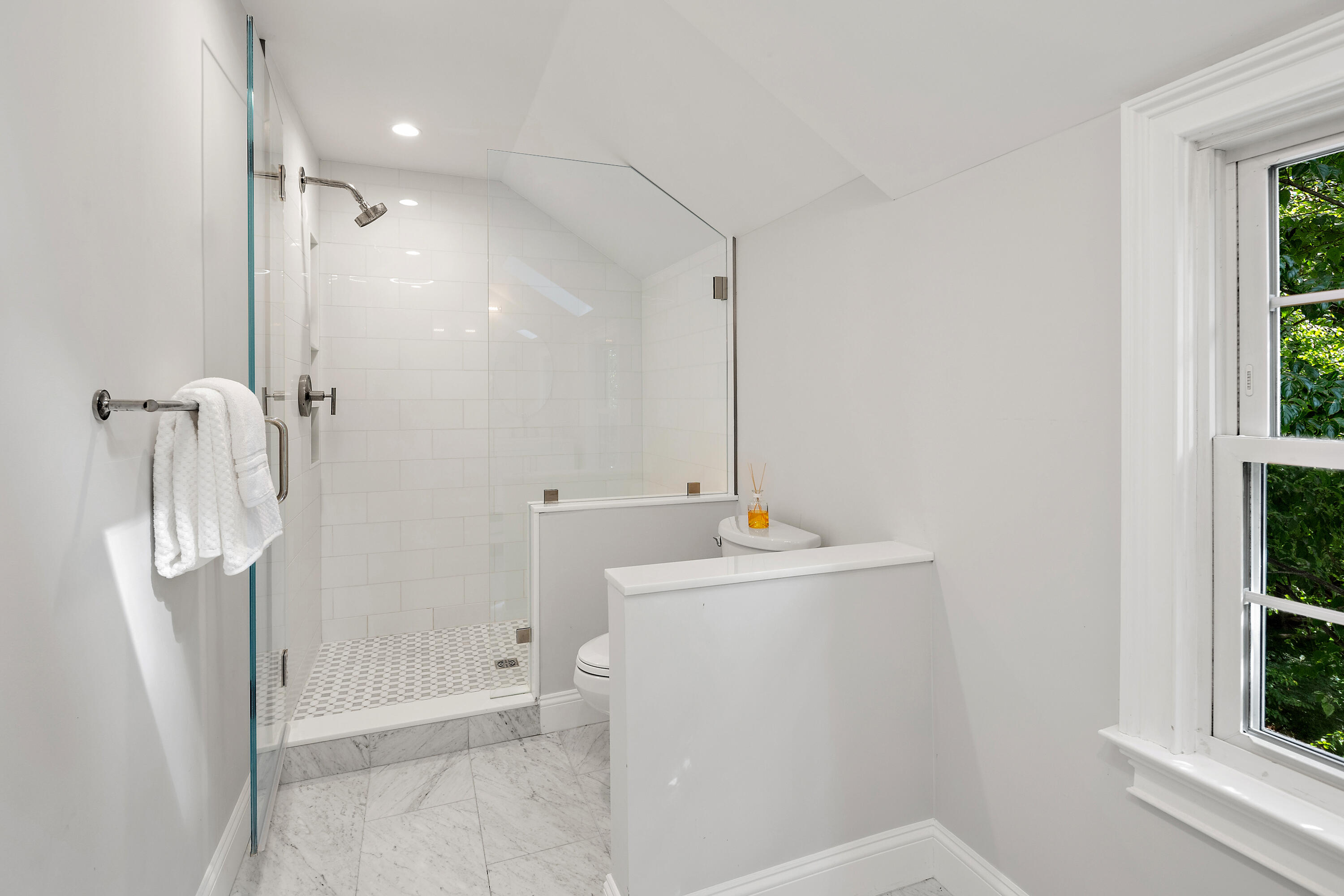 69 Mariomi Road New Canaan, CT 06840 - Photo 15 of 30 a bathroom with a sink a toilet and shower