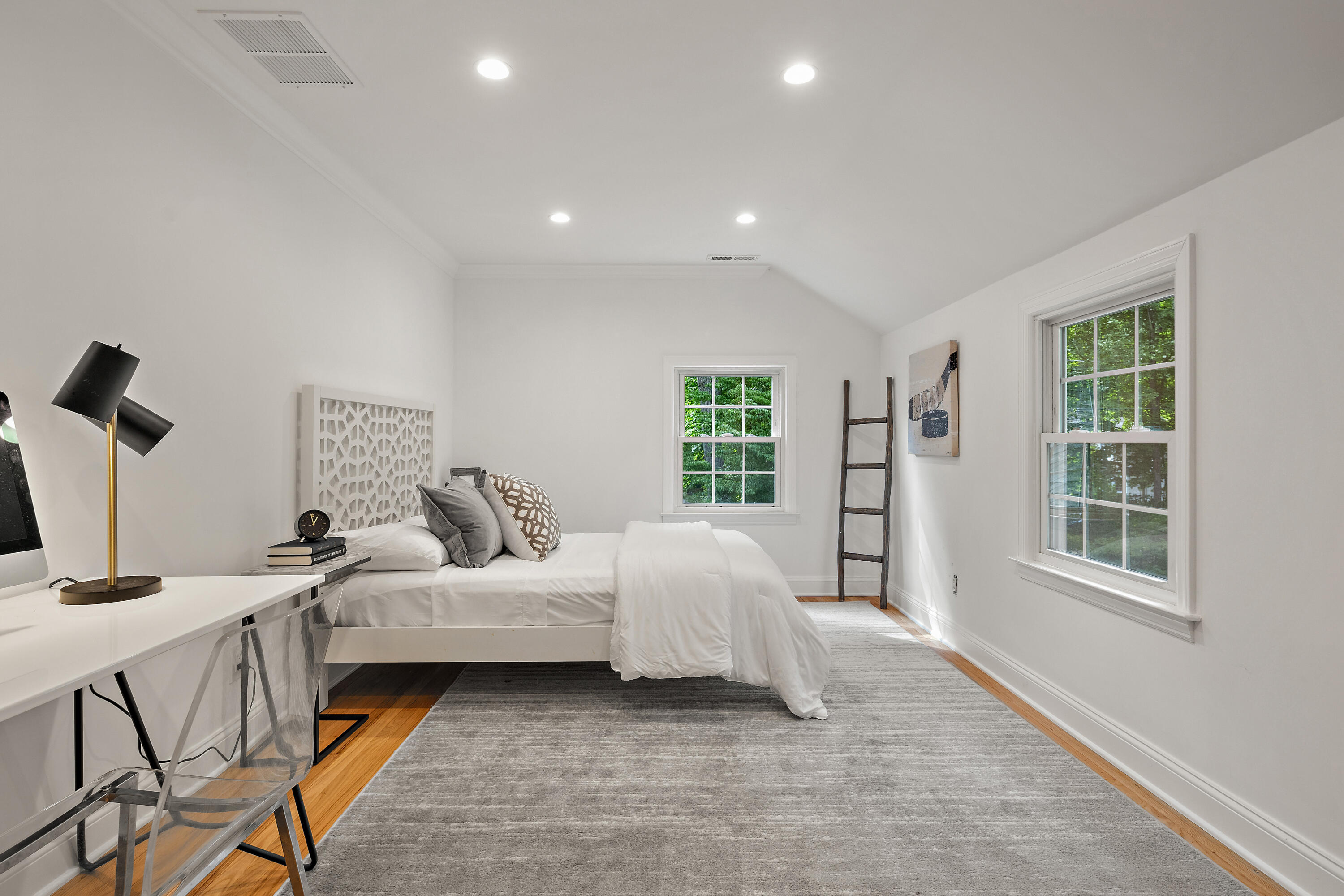 69 Mariomi Road New Canaan, CT 06840 - Photo 16 of 30 a bedroom with bed and a window