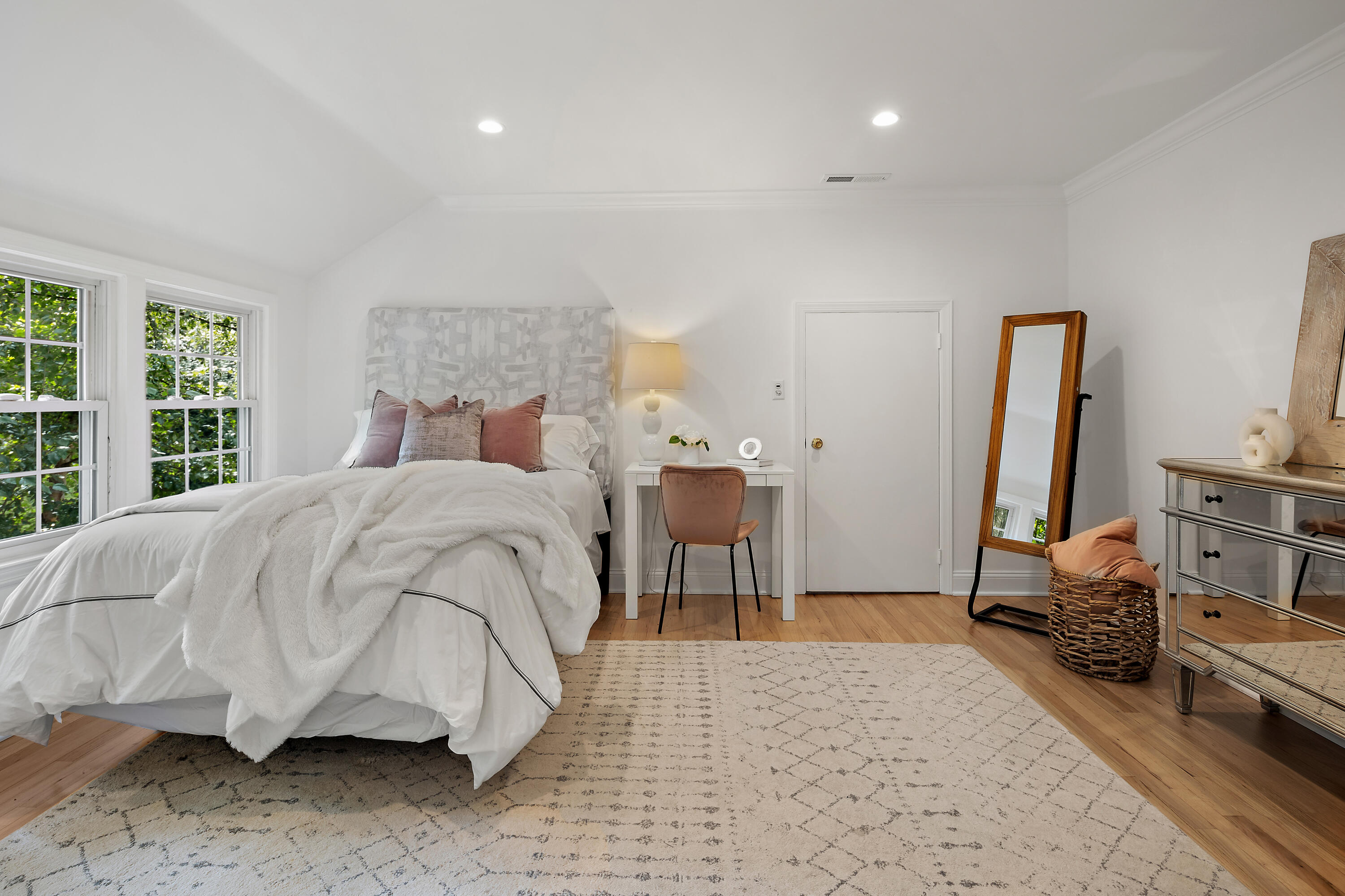 69 Mariomi Road New Canaan, CT 06840 - Photo 17 of 30 a bedroom with a bed and a large mirror