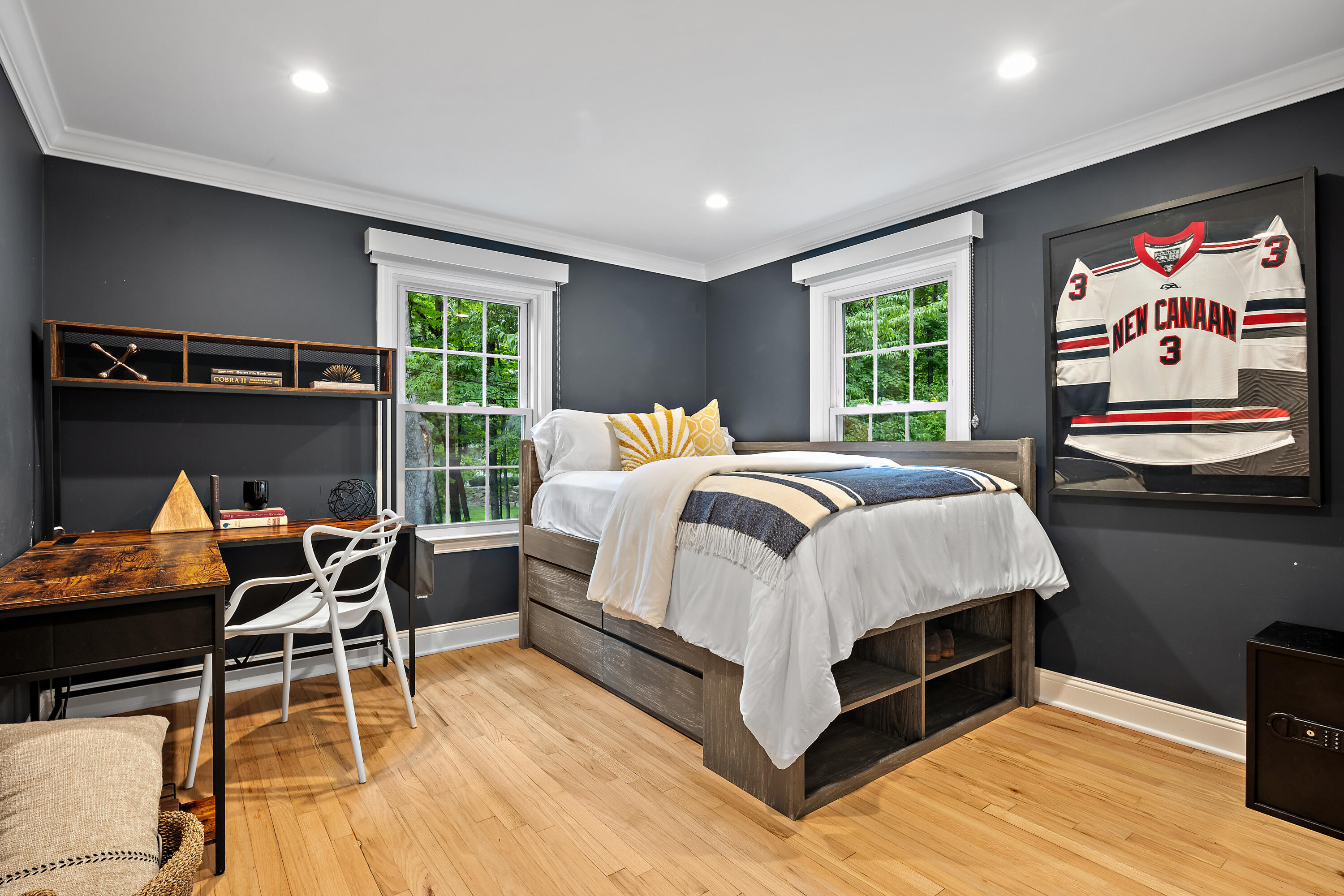 69 Mariomi Road New Canaan, CT 06840 - Photo 19 of 30 a bedroom with a bed and a flat screen tv