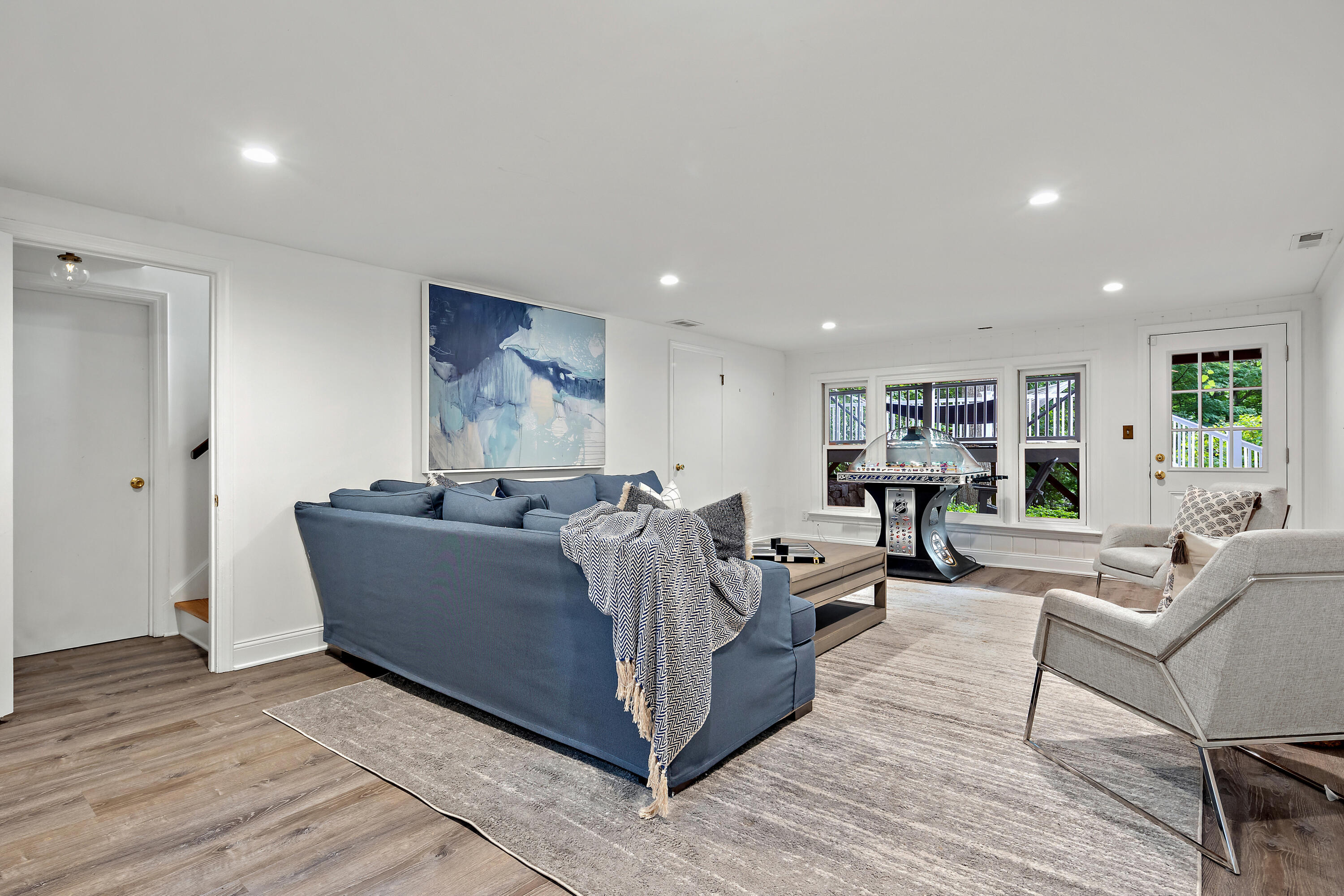 69 Mariomi Road New Canaan, CT 06840 - Photo 20 of 30 a living room with furniture and a wooden floor