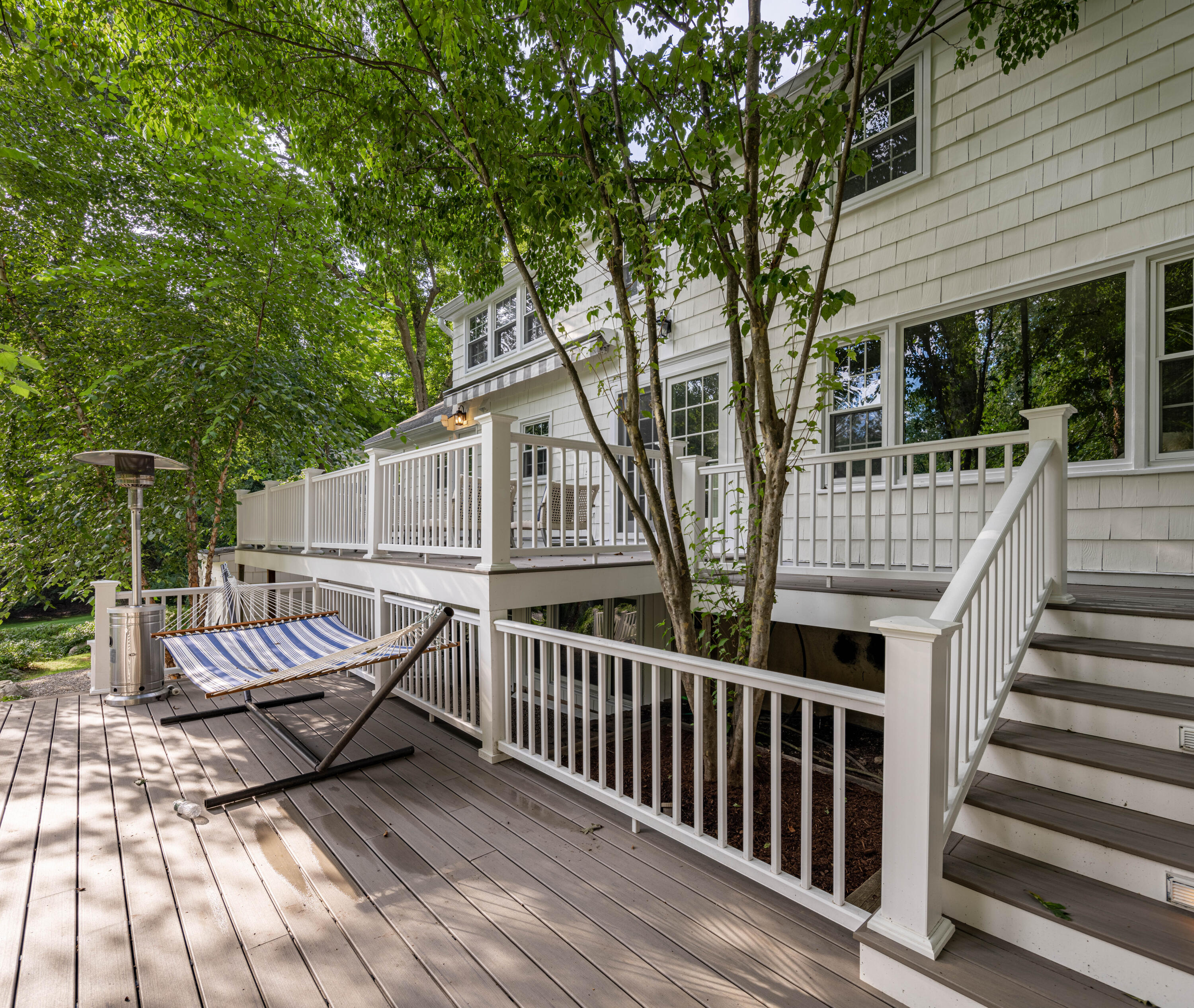 69 Mariomi Road New Canaan, CT 06840 - Photo 26 of 30 a view of deck with patio and wooden floor