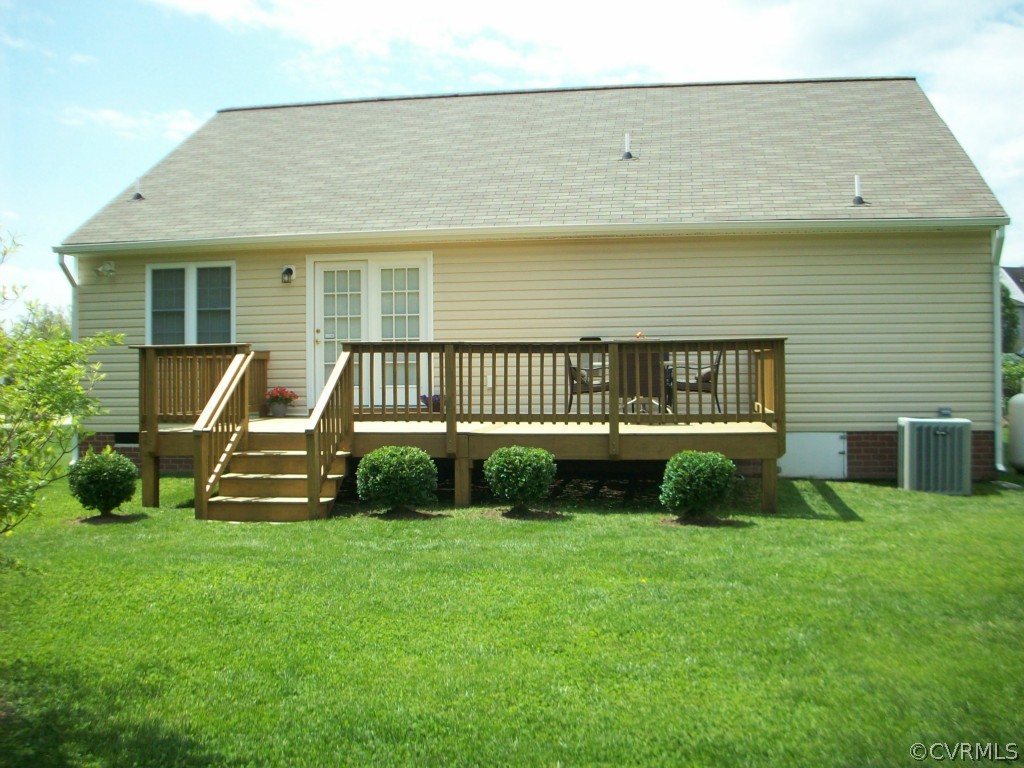 15813 Sandwave Road Chester, VA 23831 - Photo 23 of 24 a front view of a house with a garden