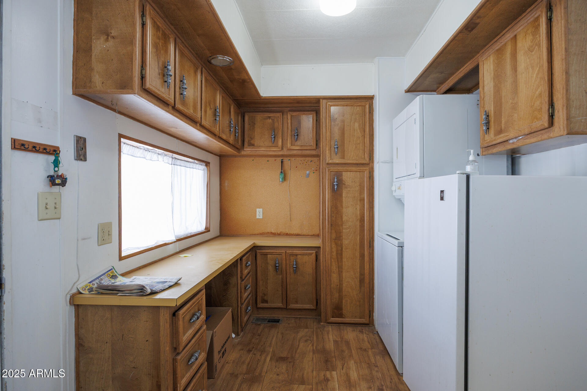 2100 North Trekell Road, Unit 144 Casa Grande, AZ 85122 - Photo 15 of 36 a view of an entryway with wooden floor