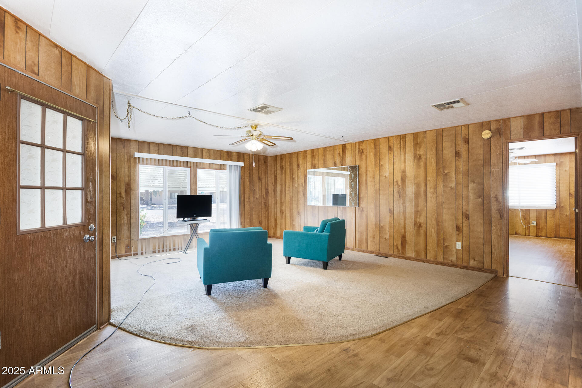 2100 North Trekell Road, Unit 144 Casa Grande, AZ 85122 - Photo 20 of 36 a view of a livingroom with furniture and a window