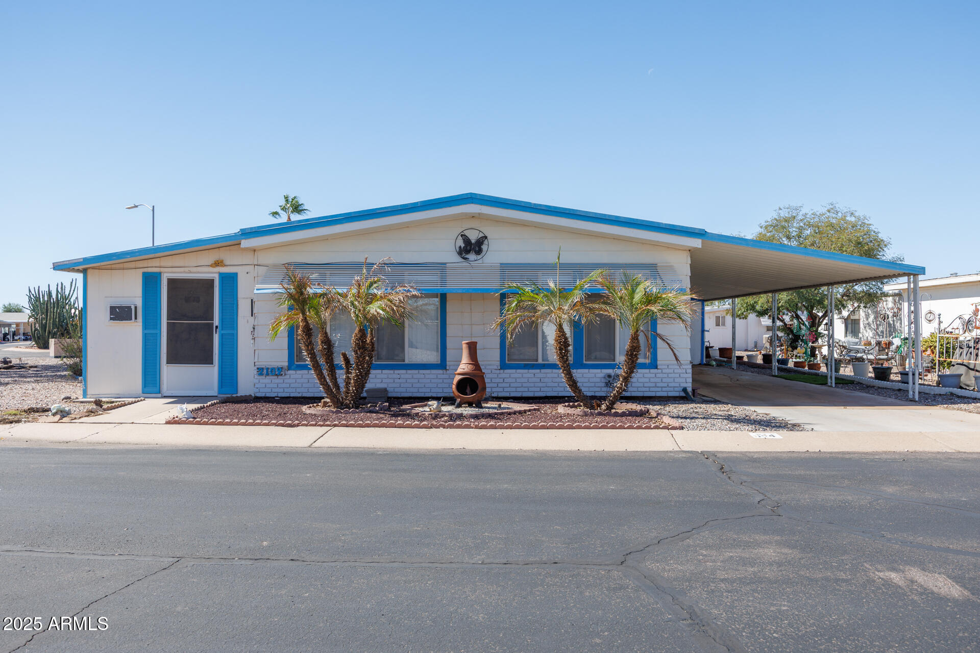 2100 North Trekell Road, Unit 144 Casa Grande, AZ 85122 - Photo 2 of 36 a view of a food mall next to a building