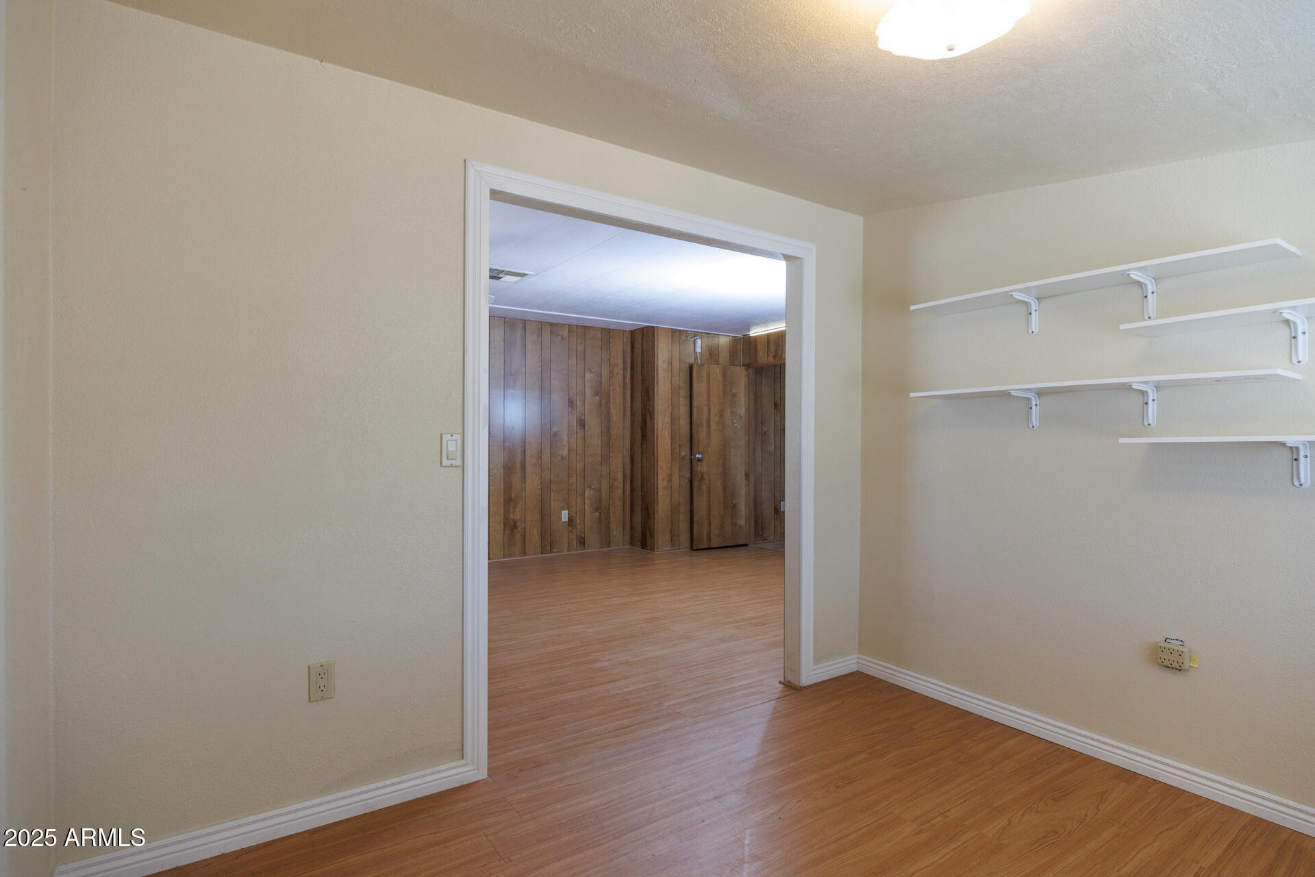 2100 North Trekell Road, Unit 144 Casa Grande, AZ 85122 - Photo 23 of 36 a view of a room with wooden floor