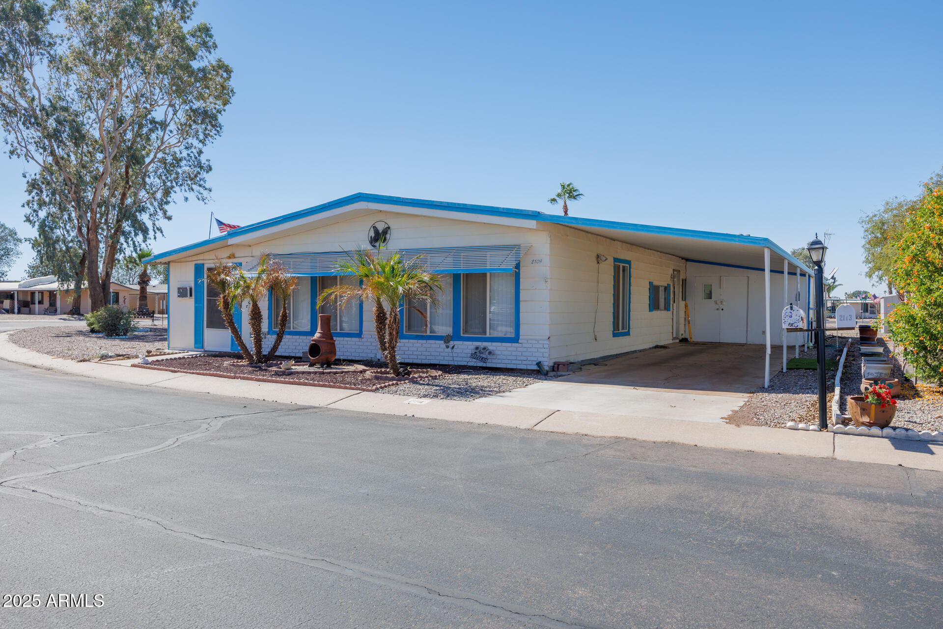 2100 North Trekell Road, Unit 144 Casa Grande, AZ 85122 - Photo 3 of 36 a view of a house with a patio