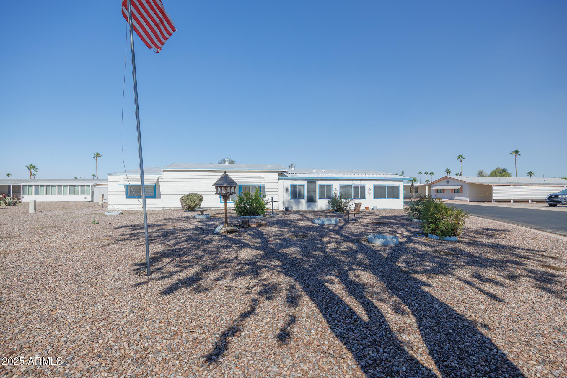 2100 North Trekell Road, Unit 144 Casa Grande, AZ 85122 - Photo 33 of 36 a view of a room with wooden floor