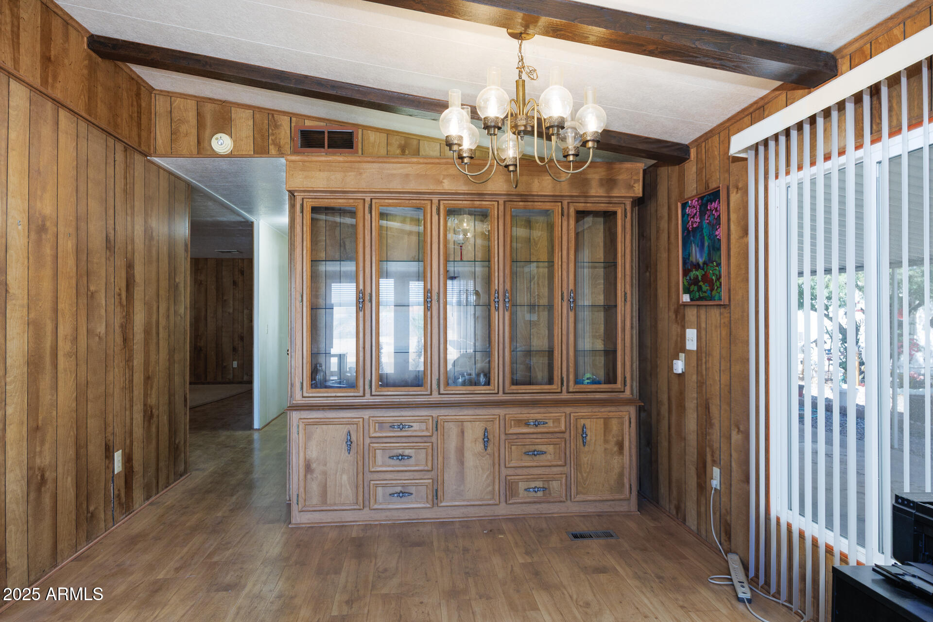 2100 North Trekell Road, Unit 144 Casa Grande, AZ 85122 - Photo 6 of 36 wooden floor in an empty room with a window