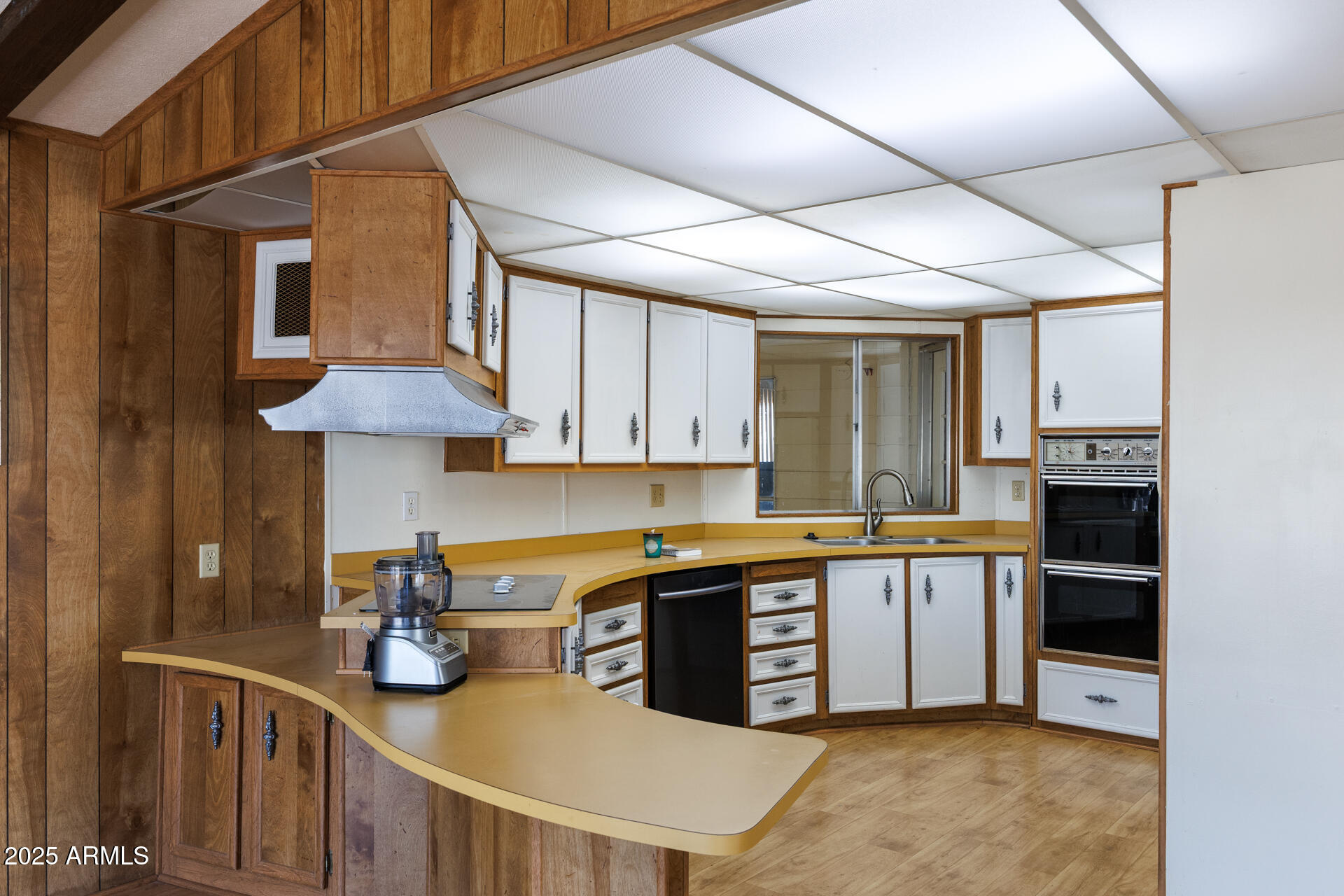 2100 North Trekell Road, Unit 144 Casa Grande, AZ 85122 - Photo 8 of 36 a kitchen with stainless steel appliances granite countertop a sink a stove and a refrigerator