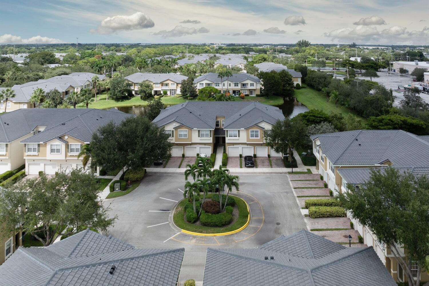 1561 Southeast Hampshire Way, Unit 104 Stuart, FL 34994 - Photo 20 of 23 an aerial view of a house