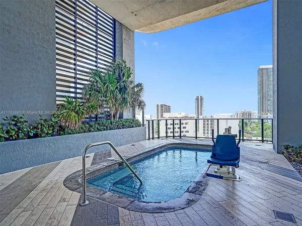 a backyard of a house with outdoor seating