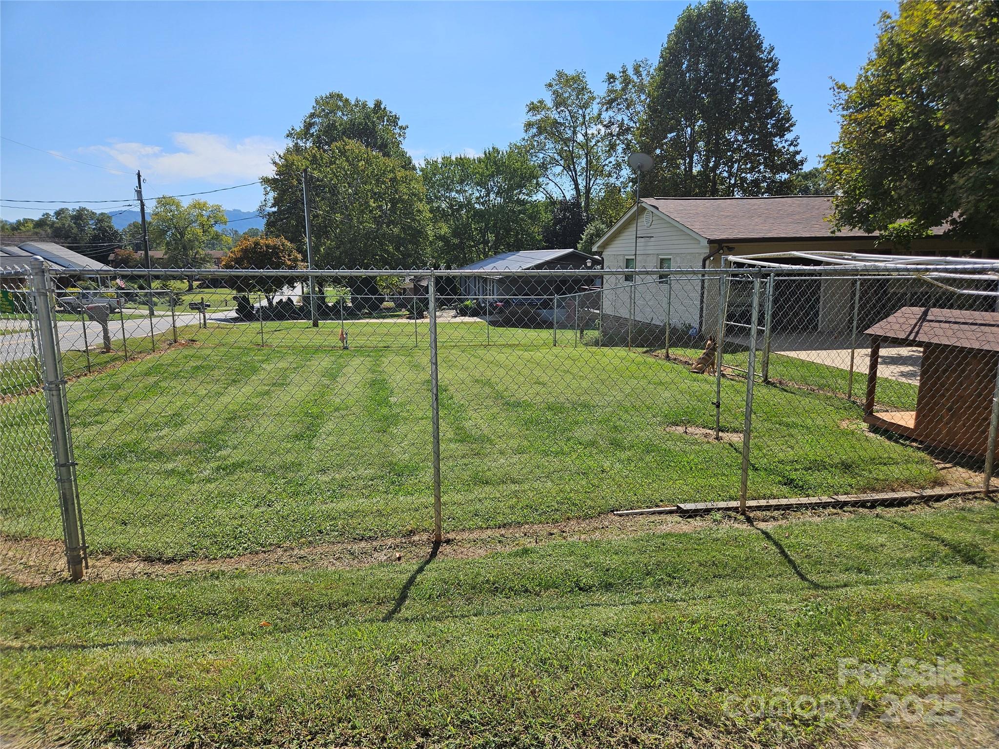 106 Gerald Road Morganton, NC 28655 - Photo 27 of 30 a view of a house with a backyard