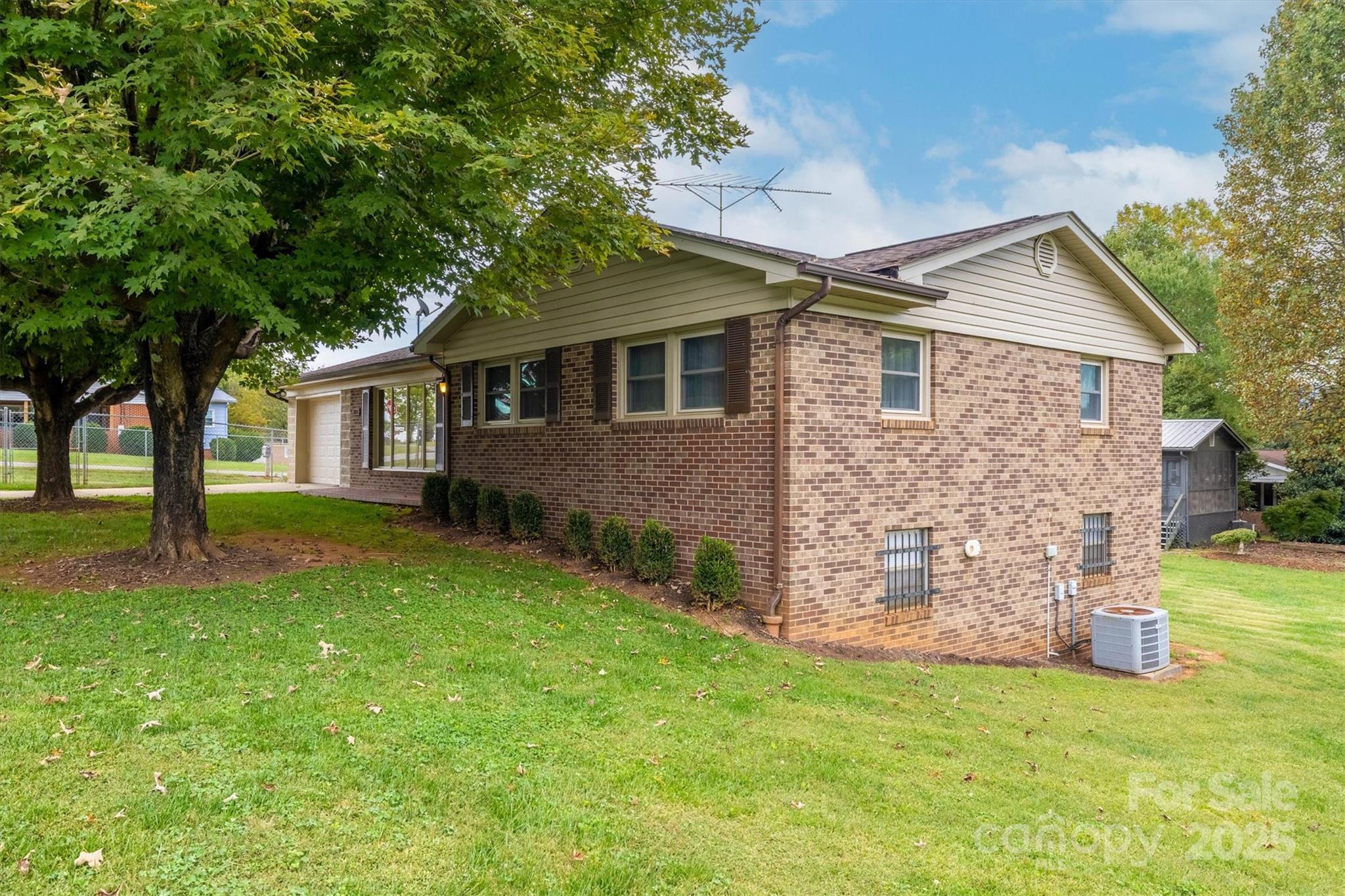 106 Gerald Road Morganton, NC 28655 - Photo 3 of 30 a front view of a house with garden