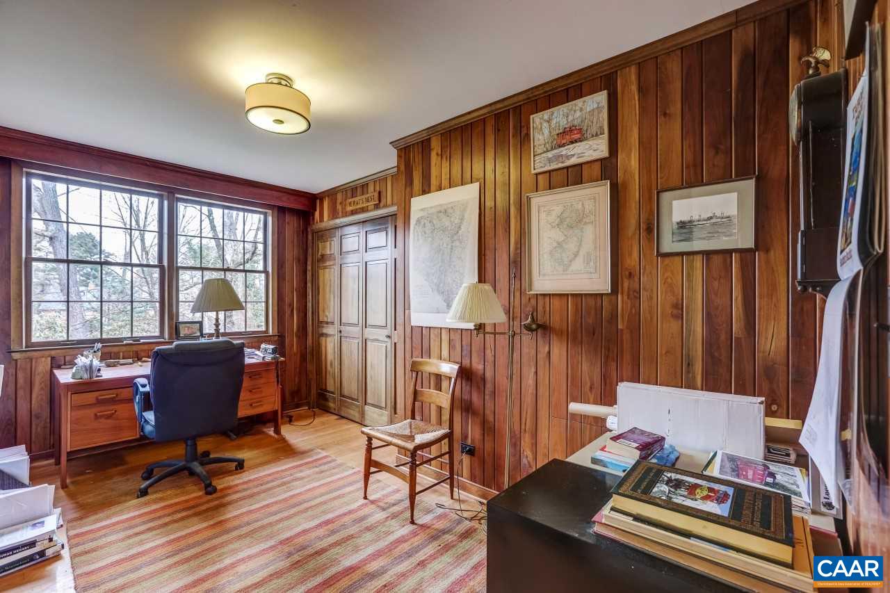 1503 Rugby Road Charlottesville, VA 22903 - Photo 19 of 40 a workspace with furniture window and wooden floor