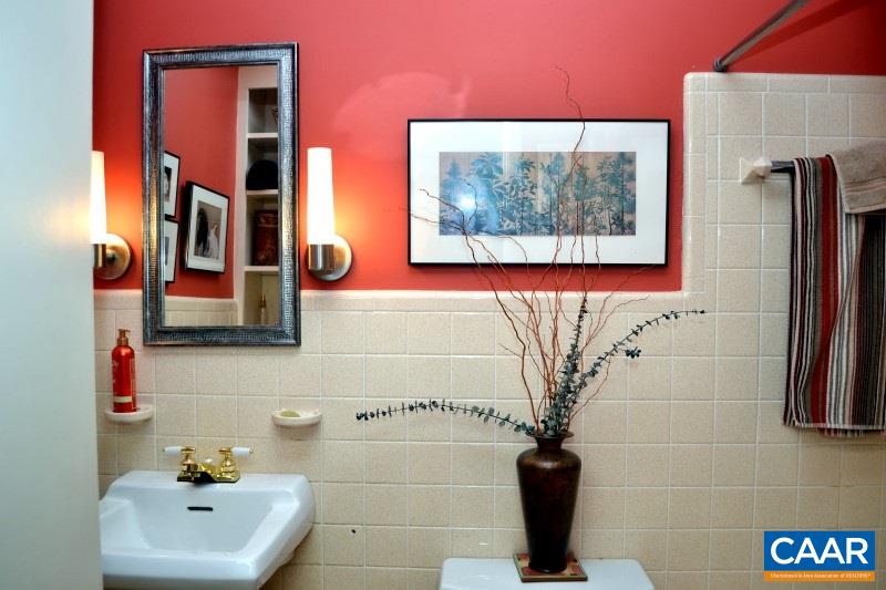1503 Rugby Road Charlottesville, VA 22903 - Photo 20 of 40 a bathroom with a sink and a mirror