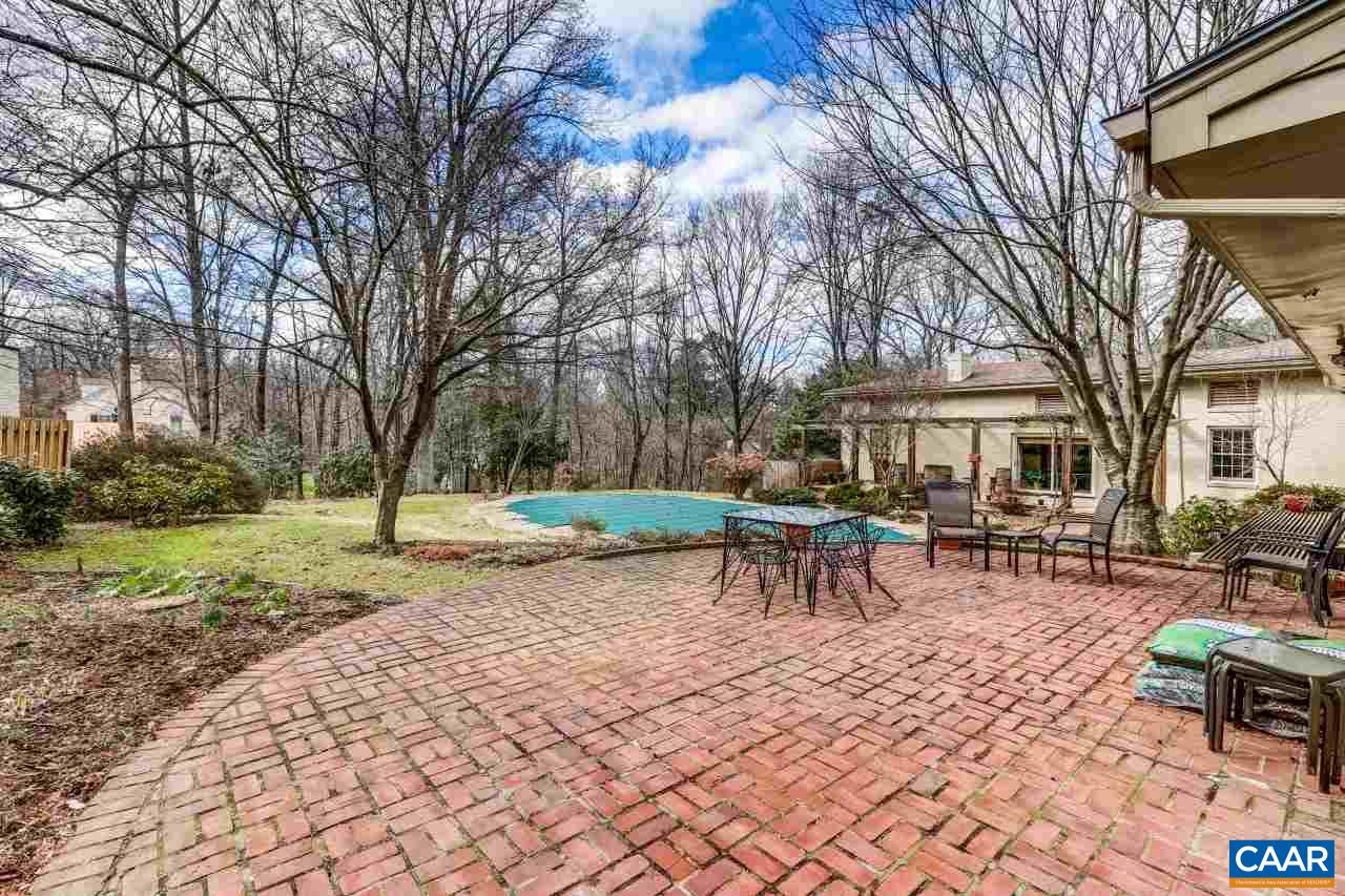 1503 Rugby Road Charlottesville, VA 22903 - Photo 31 of 40 a view of a table and chairs in a yard