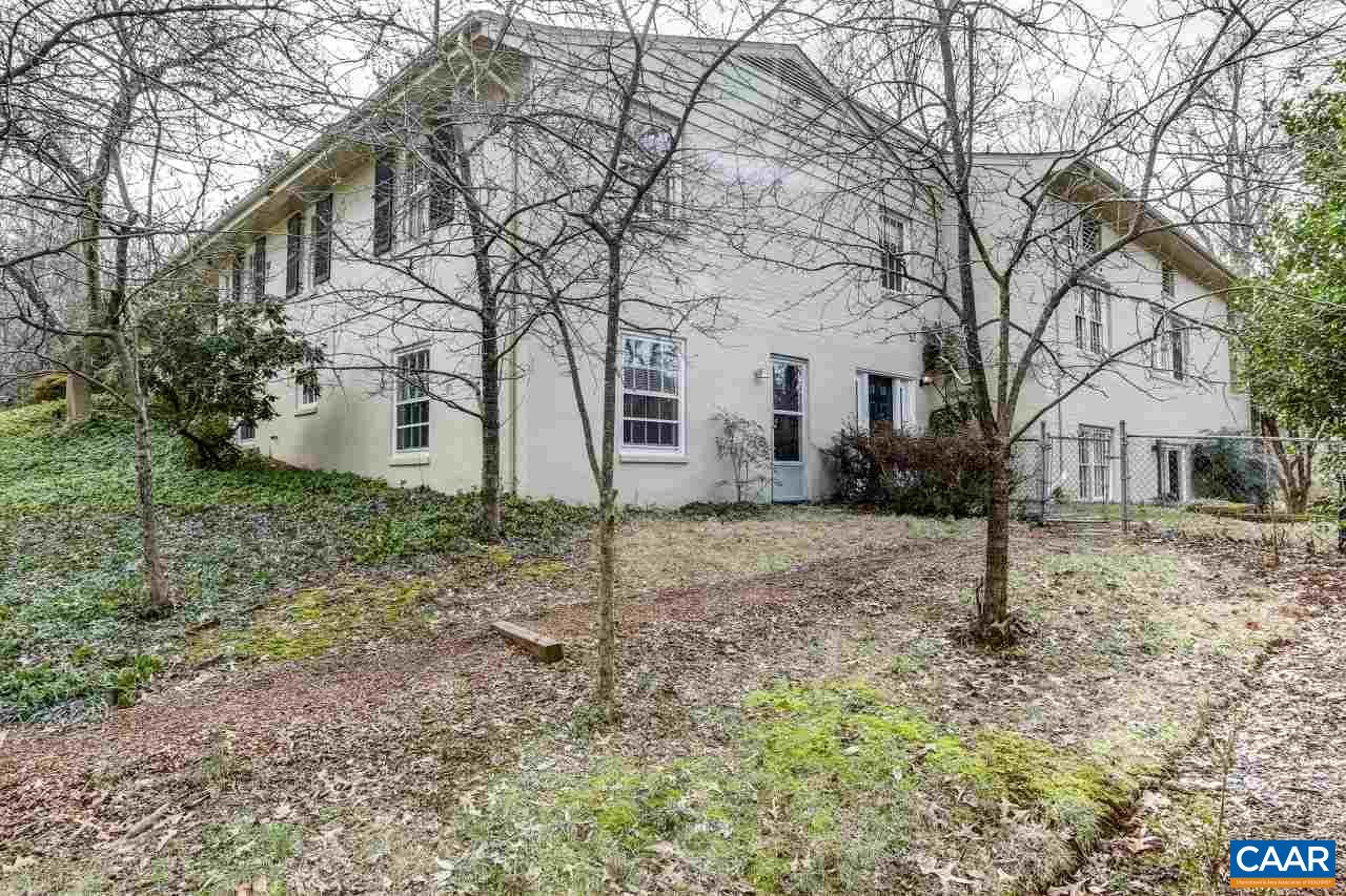 1503 Rugby Road Charlottesville, VA 22903 - Photo 37 of 40 a white house that has a tree in front of the house