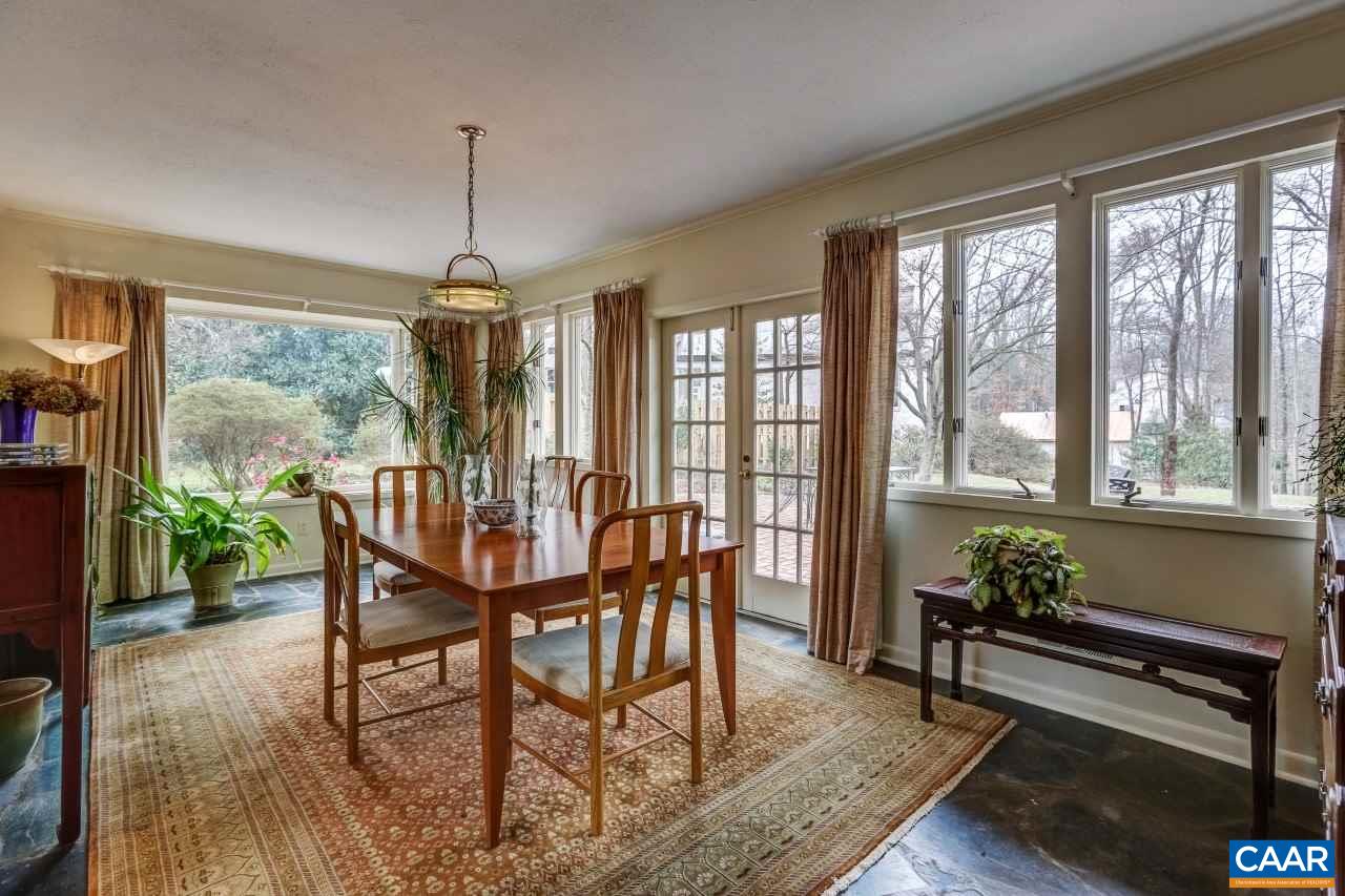 1503 Rugby Road Charlottesville, VA 22903 - Photo 4 of 40 a dining room with furniture window wooden floor