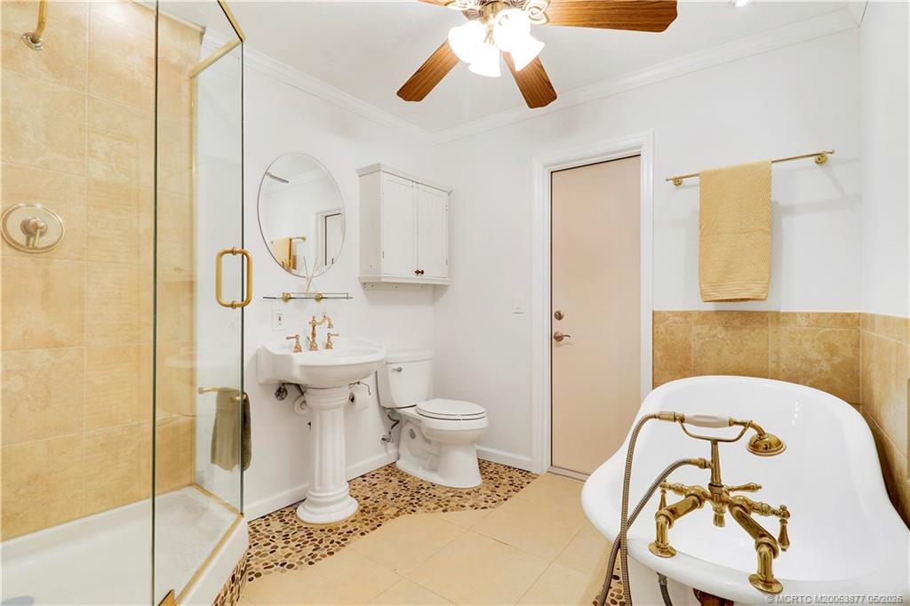 10941 Southwest Hawkview Circle Stuart, FL 34997 - Photo 17 of 36 Guest Bathroom
