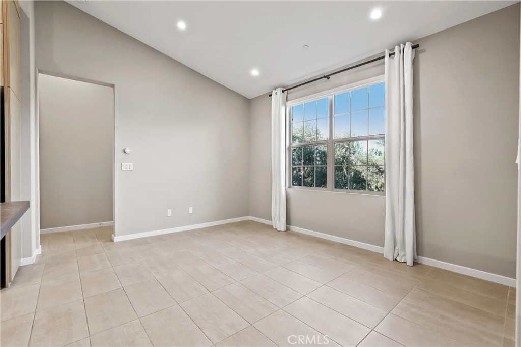110 Coastal Garden Irvine, CA 92618 - Photo 14 of 33 a view of an empty room with a window
