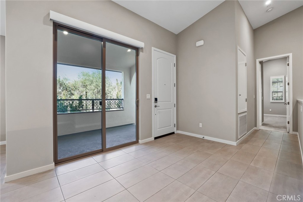 110 Coastal Garden Irvine, CA 92618 - Photo 18 of 33 an empty room with windows and closet