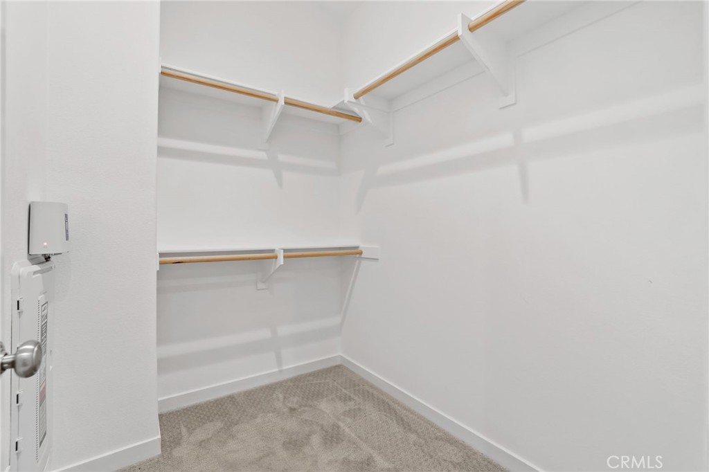 110 Coastal Garden Irvine, CA 92618 - Photo 23 of 33 a view of an empty walk in closet