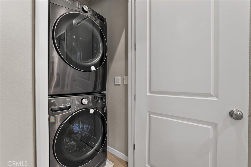 110 Coastal Garden Irvine, CA 92618 - Photo 24 of 33 a close view of a utility room with dryer and washer