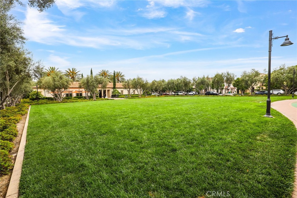 110 Coastal Garden Irvine, CA 92618 - Photo 31 of 33 a view of a big yard with a large tree and a yard