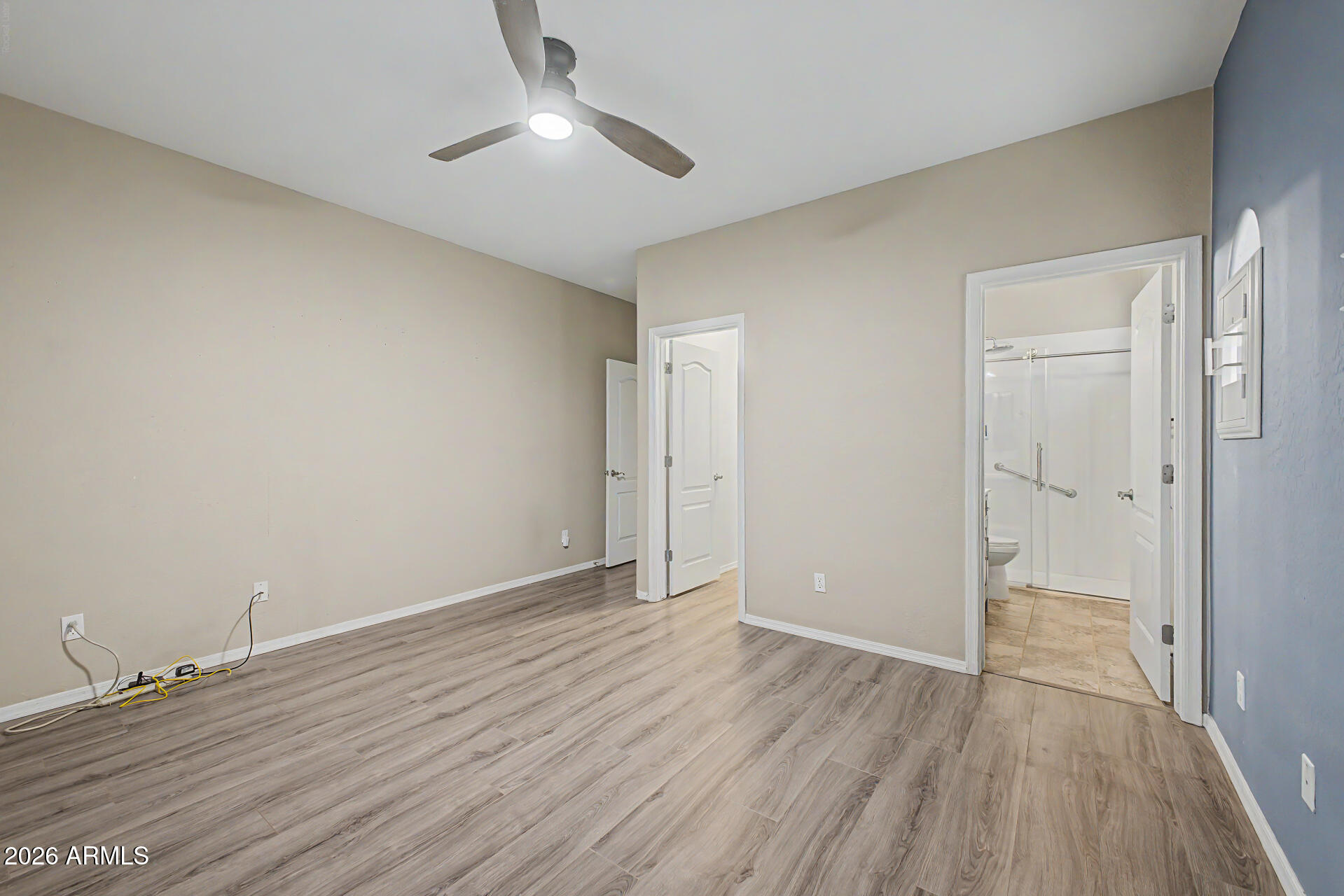 2600 East Springfield Place, Unit 109 Chandler, AZ 85286 - Photo 15 of 38 wooden floor in an empty room