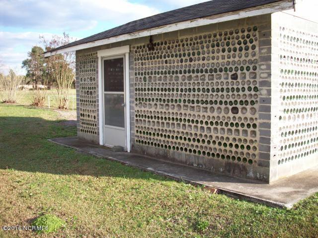 1020 Barnes Road Orrum, NC 28369 - Photo 9 of 28 9 glass bottle