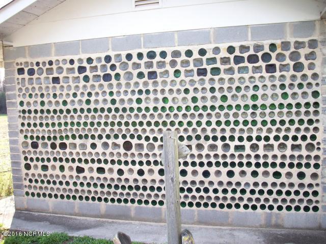 1020 Barnes Road Orrum, NC 28369 - Photo 10 of 28 10 glass bottle