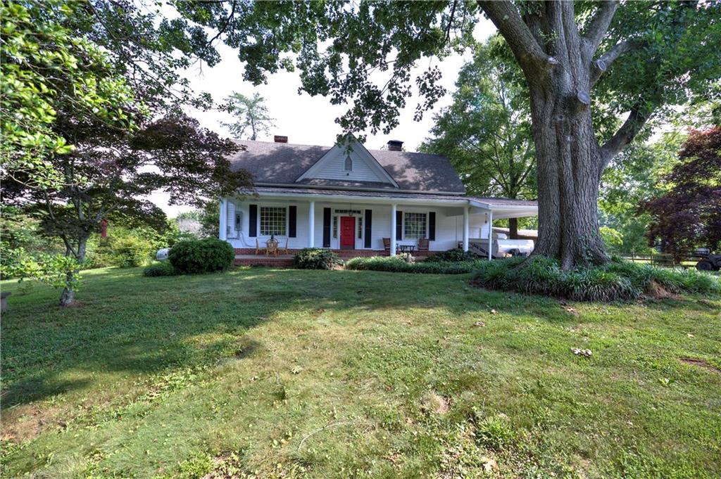 250 Spring Place Road Northwest White, GA 30184 - Photo 1 of 1 Magnificent old oaks grace this beautiful old farm house!