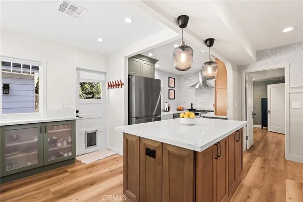 a kitchen with a counter space and a sink