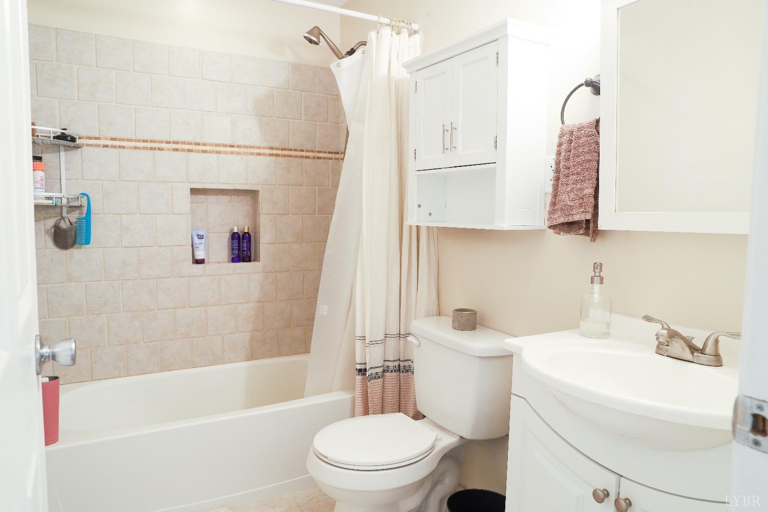 483 Pauls Road Rustburg, VA 24588 - Photo 15 of 21 a bathroom with a sink toilet and shower